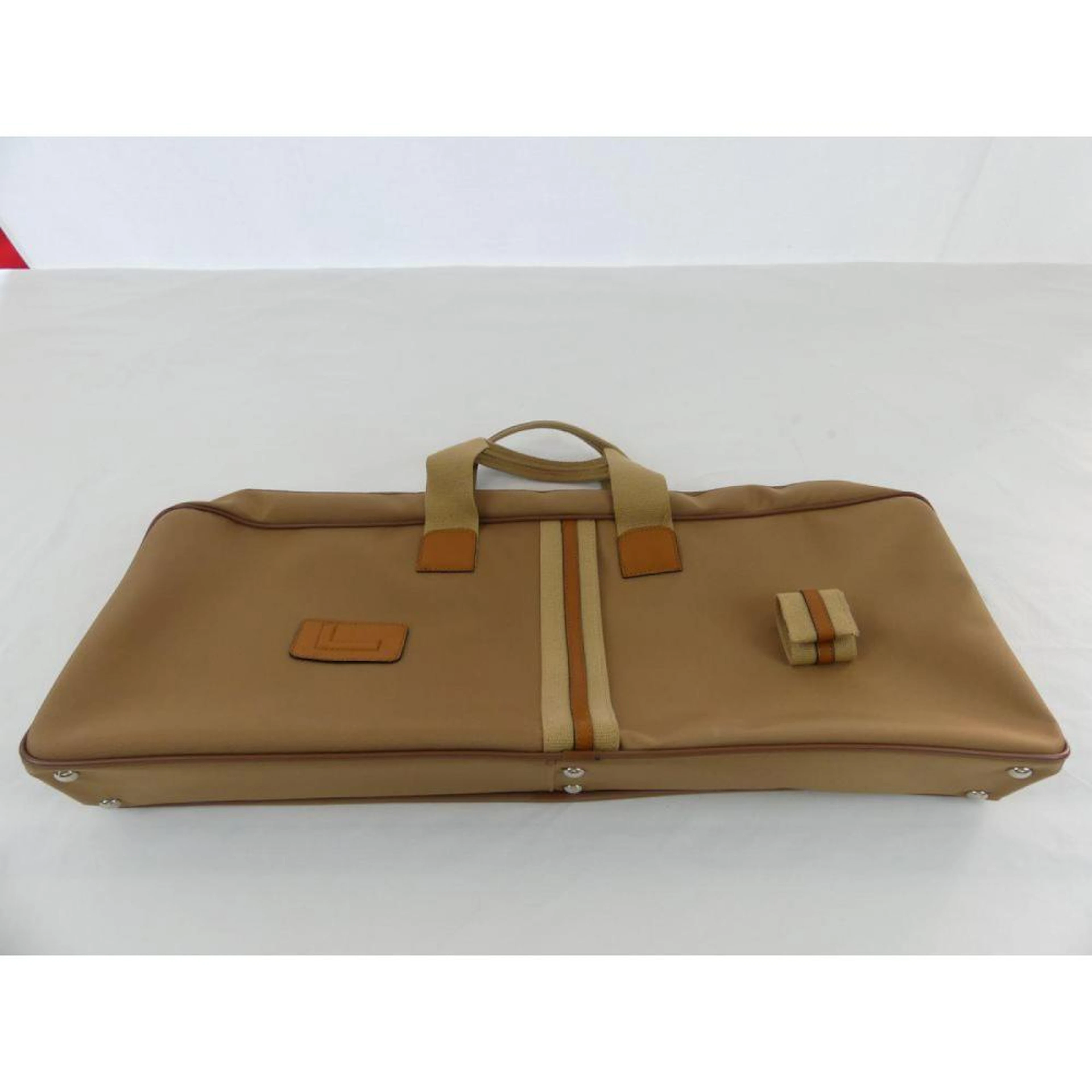 LANCEL. Malette de Tennis en toile beige et cuir gold
