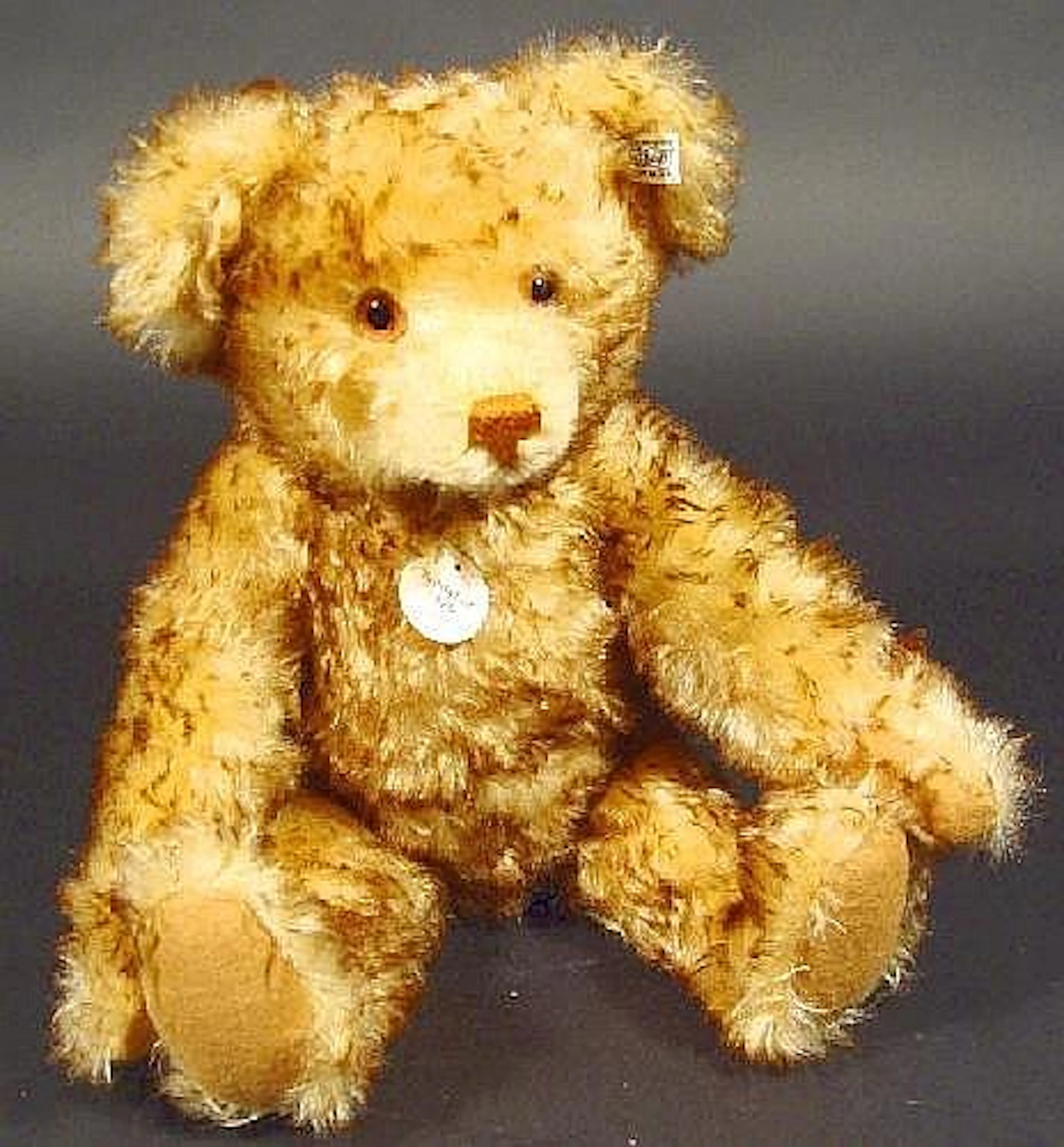 Steiff jointed brown teddy bear, a replica from 1926, with label and