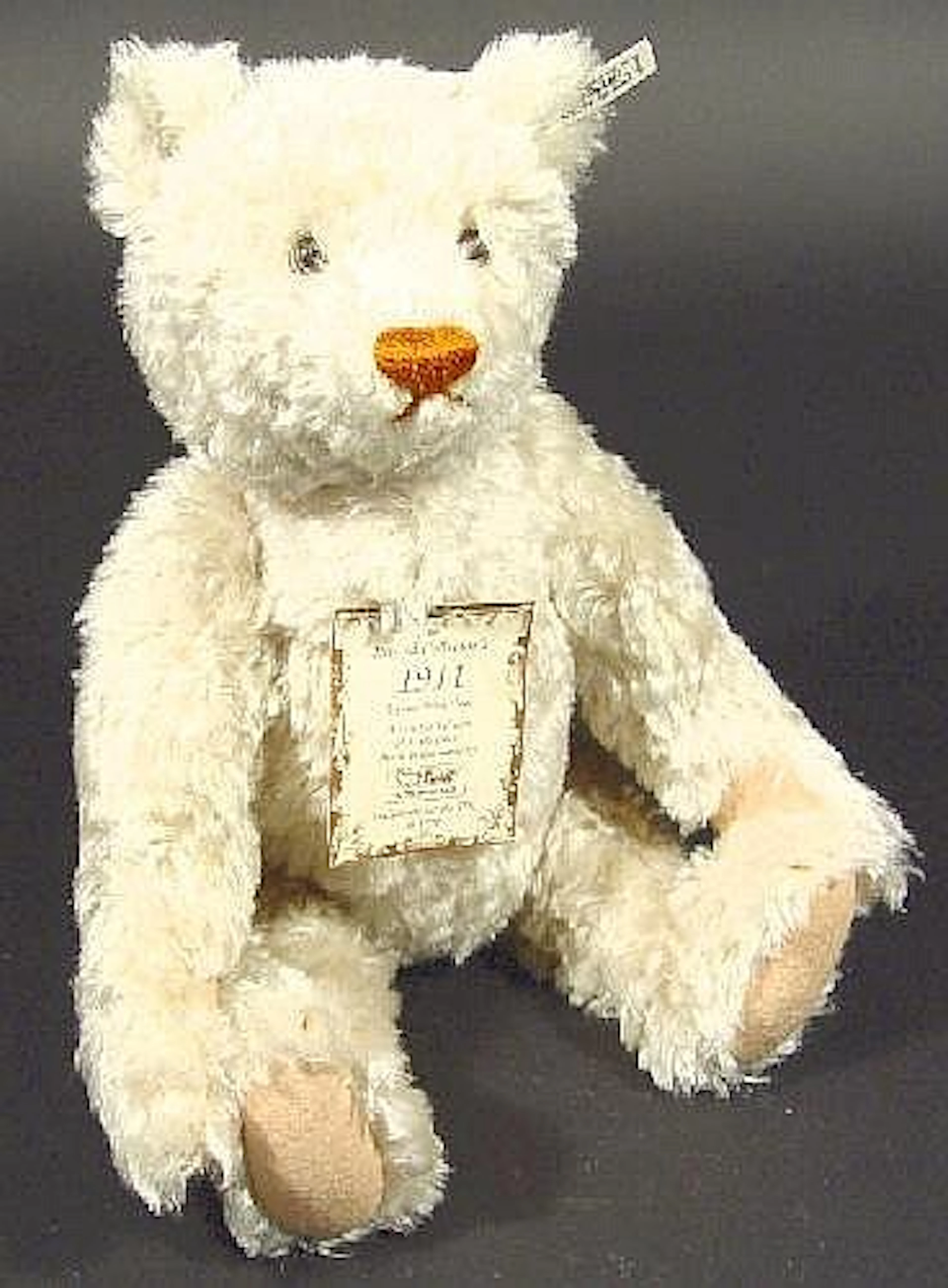 Steiff jointed grey teddy bear, a replica from 1911, with original