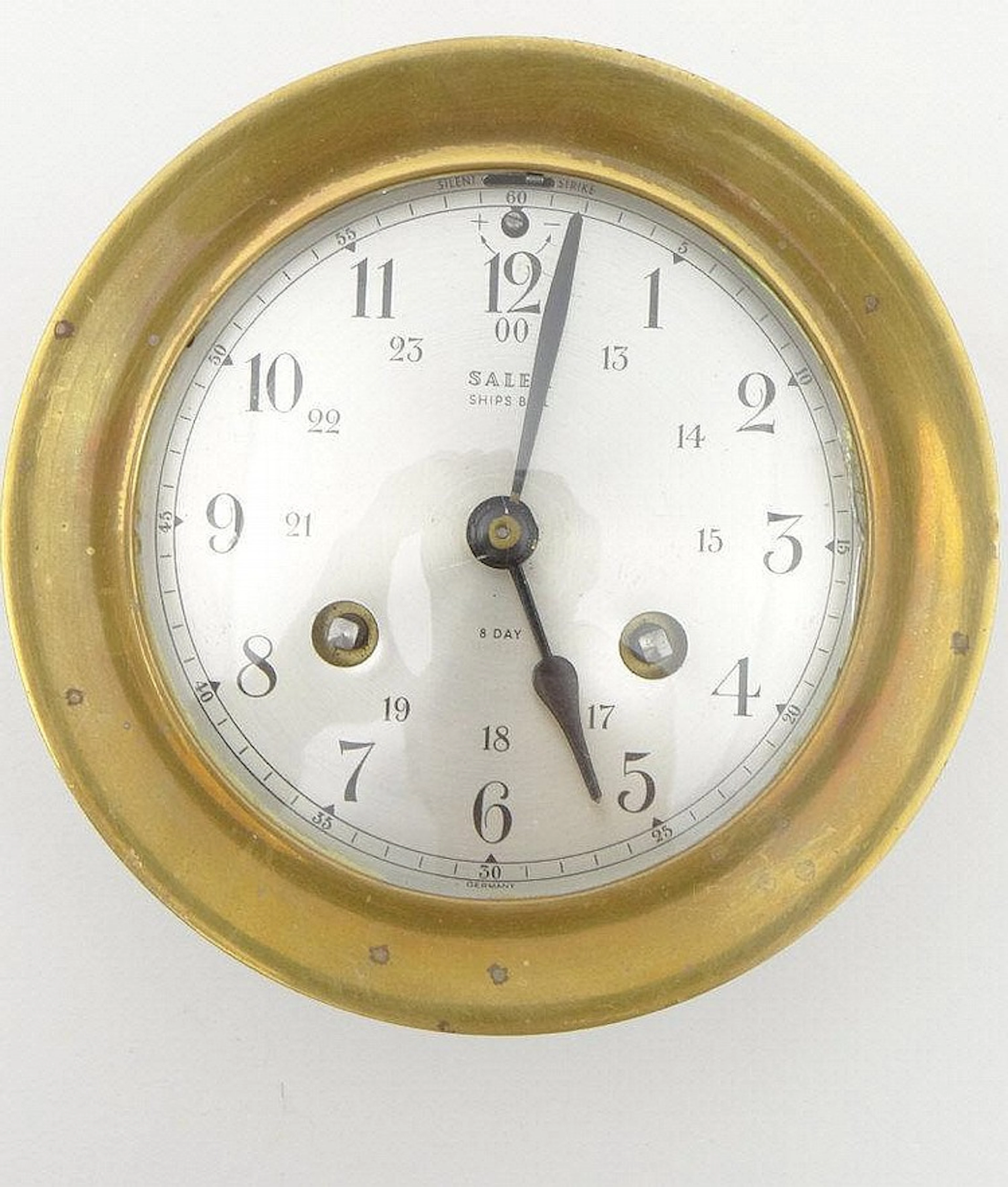 Good small brass cased ship's bulkhead clock by