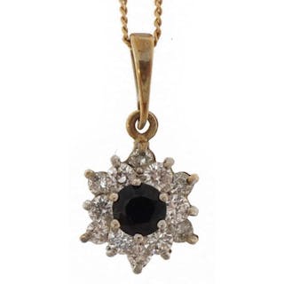 9ct gold sapphire and clear stone flower head pendant on a 9...