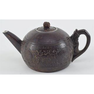 Carved coconut teapot. China. 19th century. Surface carved with floral