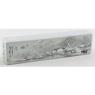 Porcelain paperweight. China. 20th century. Winter scene. 8.25in length.