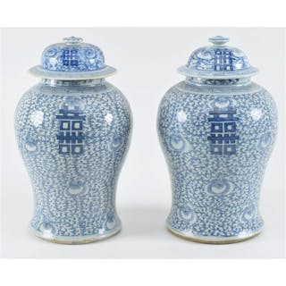 Pair of covered jars. China. 19th/20th century. Baluster form. Underglaze