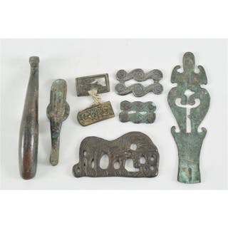 8 ancient bronze fittings. China. Largest 4.5in L.
