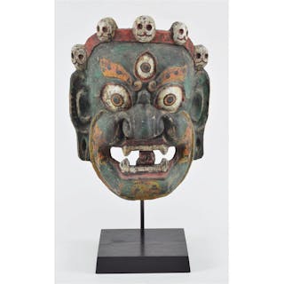 Carved wooden mask. Nepal or Tibet. 19th century. Mahakala with a