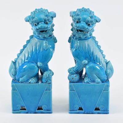 Pair of foo dogs. China. Early 20th century. Turquoise glaze. 16in H.
