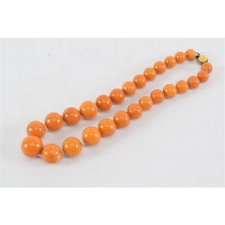 Set of butterscotch amber graduated beads. 18.5in length.