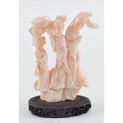 Coral carving. China. 20th century. Carved as Kuan Yin and attendants.