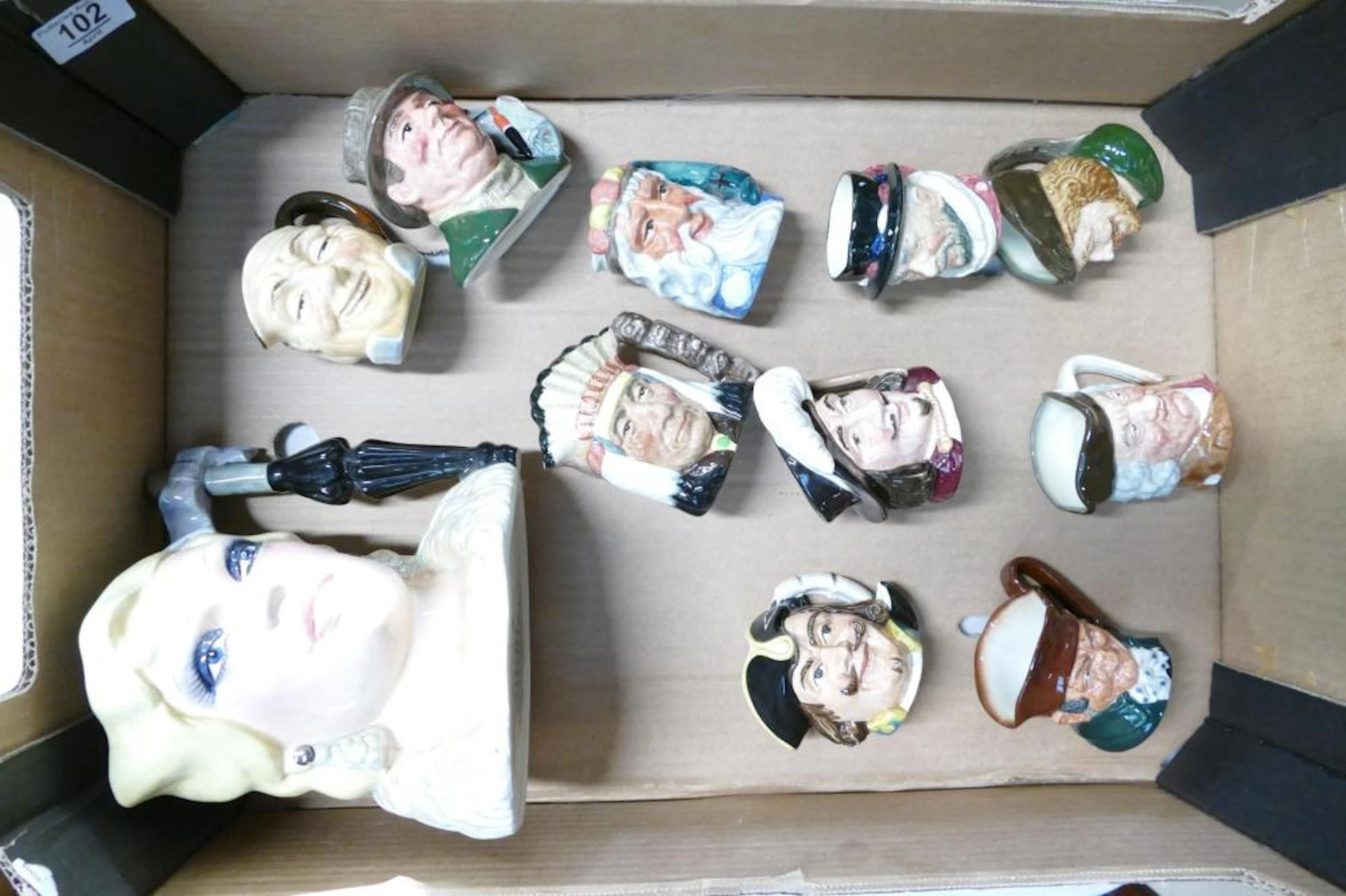 A Collection of Royal Doulton Character jugs to include
