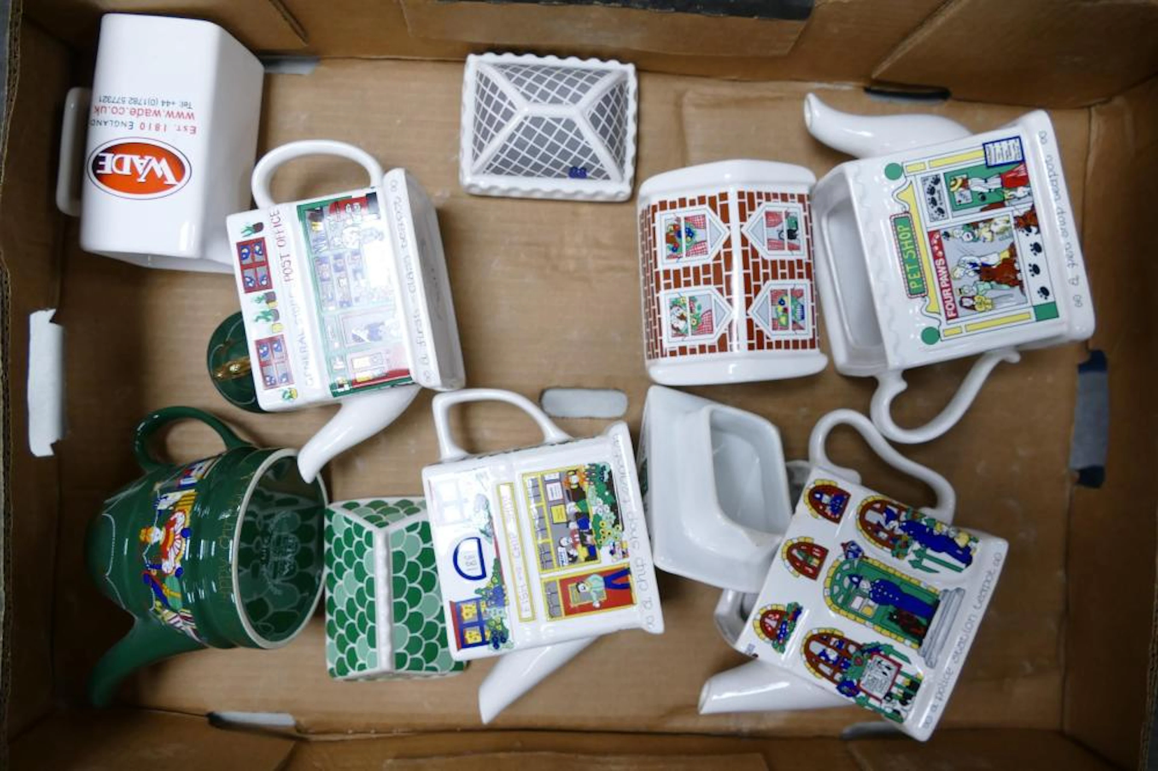 A collection of Wade Ceramic Novelty Teapots