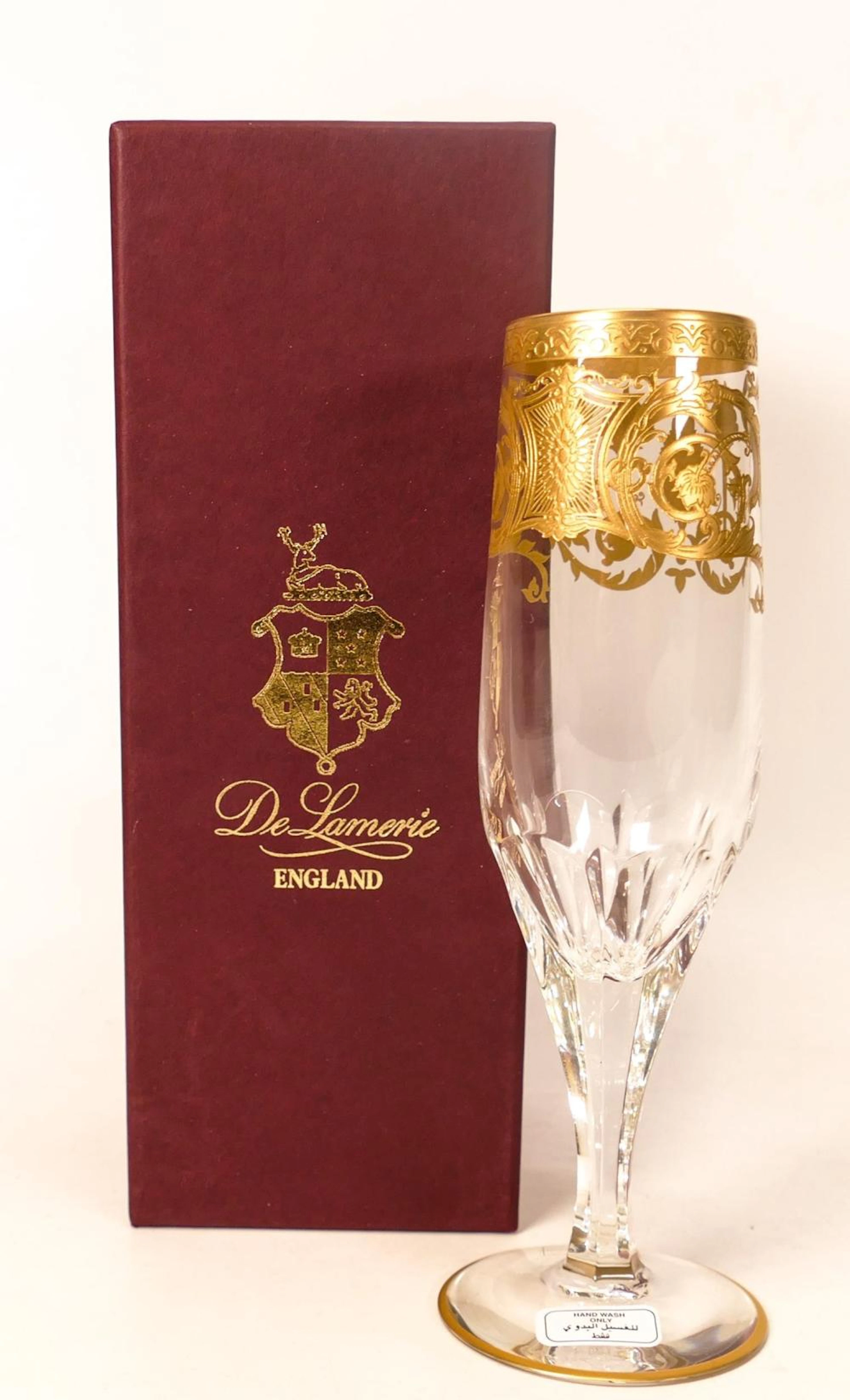 Eight De Lamerie Fine Bone China heavily gilded Robert...