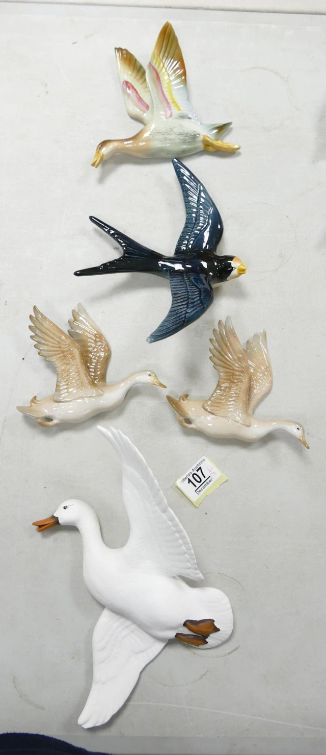 A collection of Wild Bird Theme Mid Century Wall Plaques, largest length 26cm(5)