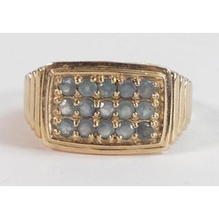 Ladies 9ct gold ring set with single pale blue stones, size T/U,7.7g.