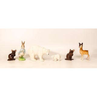 A mixed collection of pottery figures to include Weatherby Polar Bear & Cub