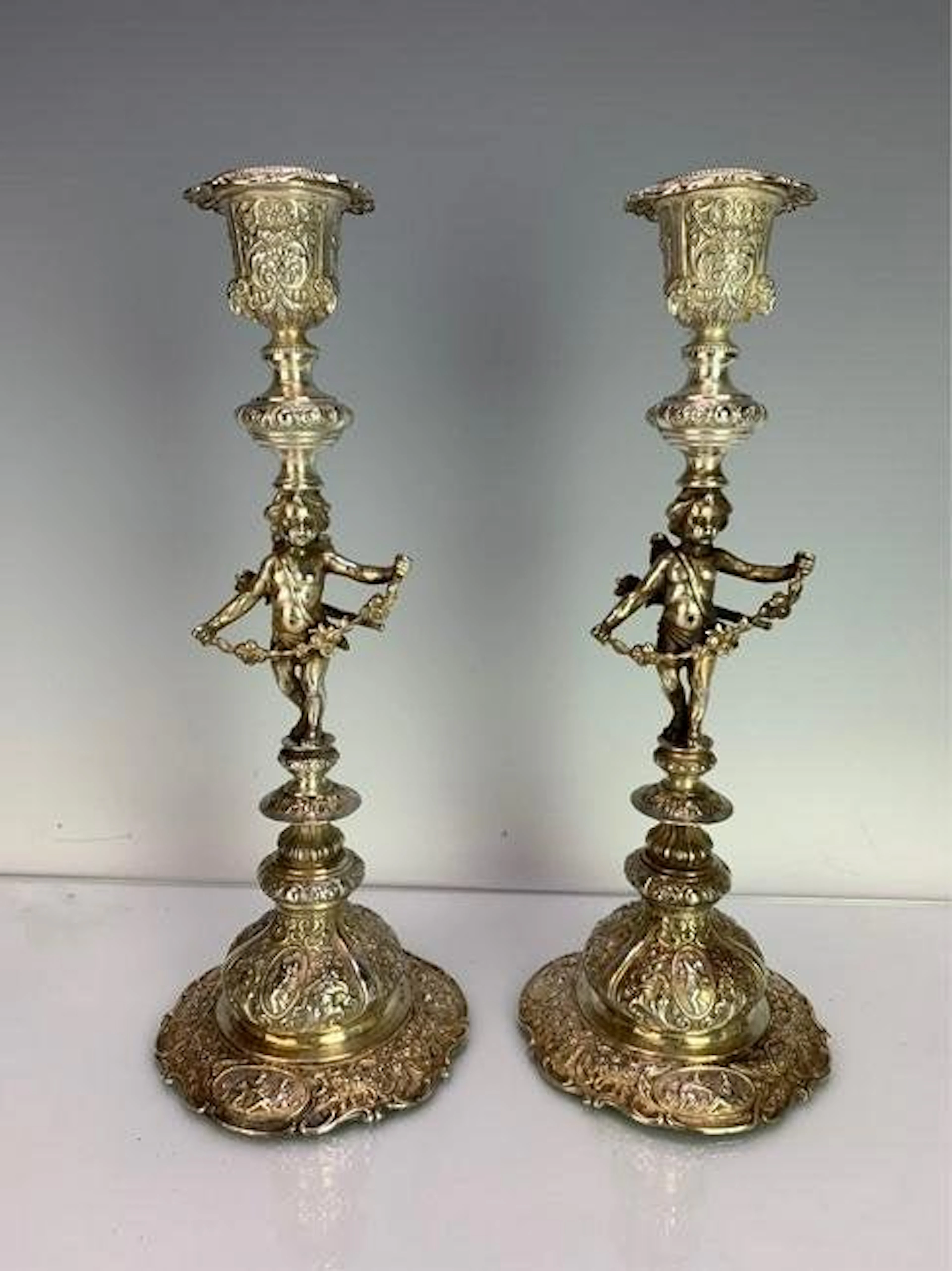 A LARGE PAIR OF CONTINENTAL SILVER CANDELSTICKS