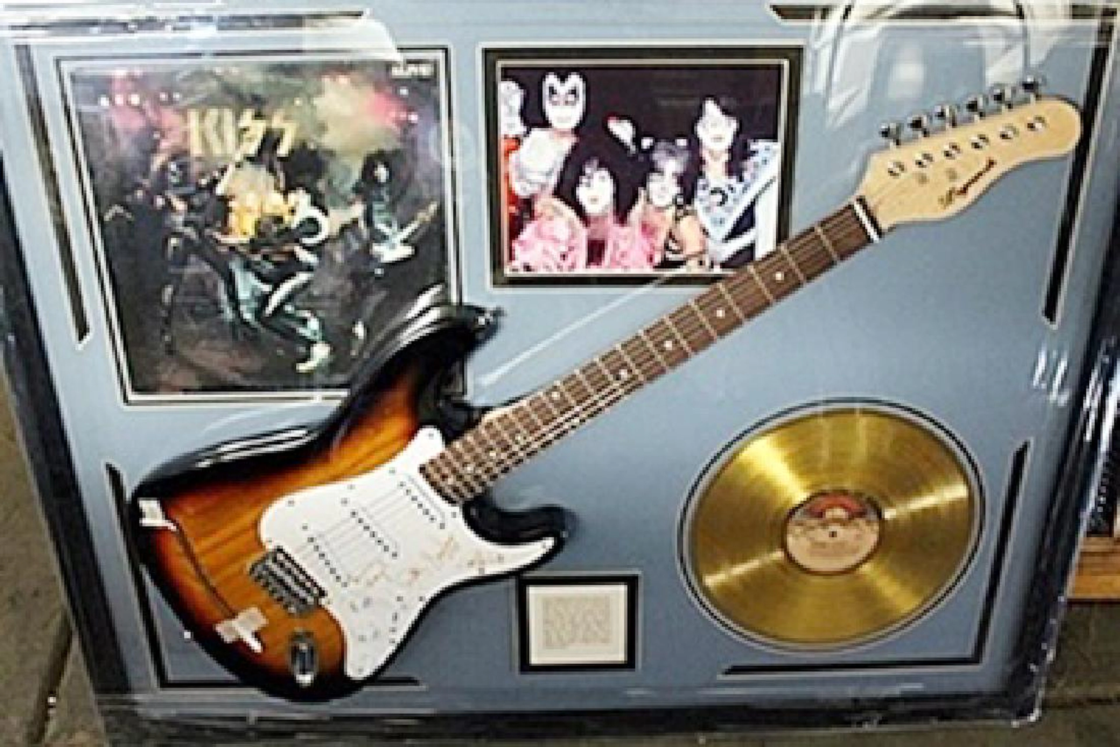 Kiss Signed Guitar & Memorabilia