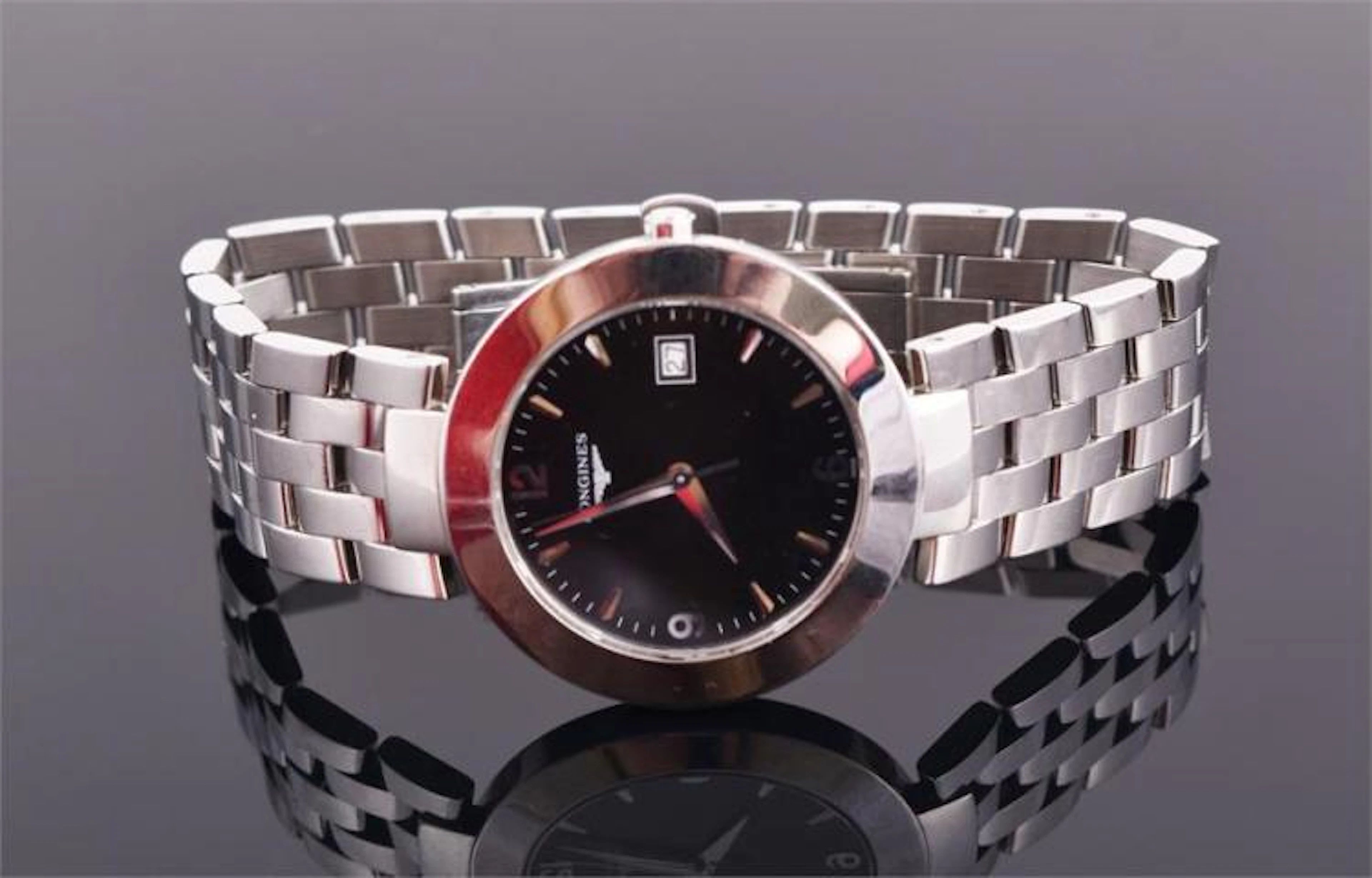 A Longines DolceVita stainless steel wristwatch the black...