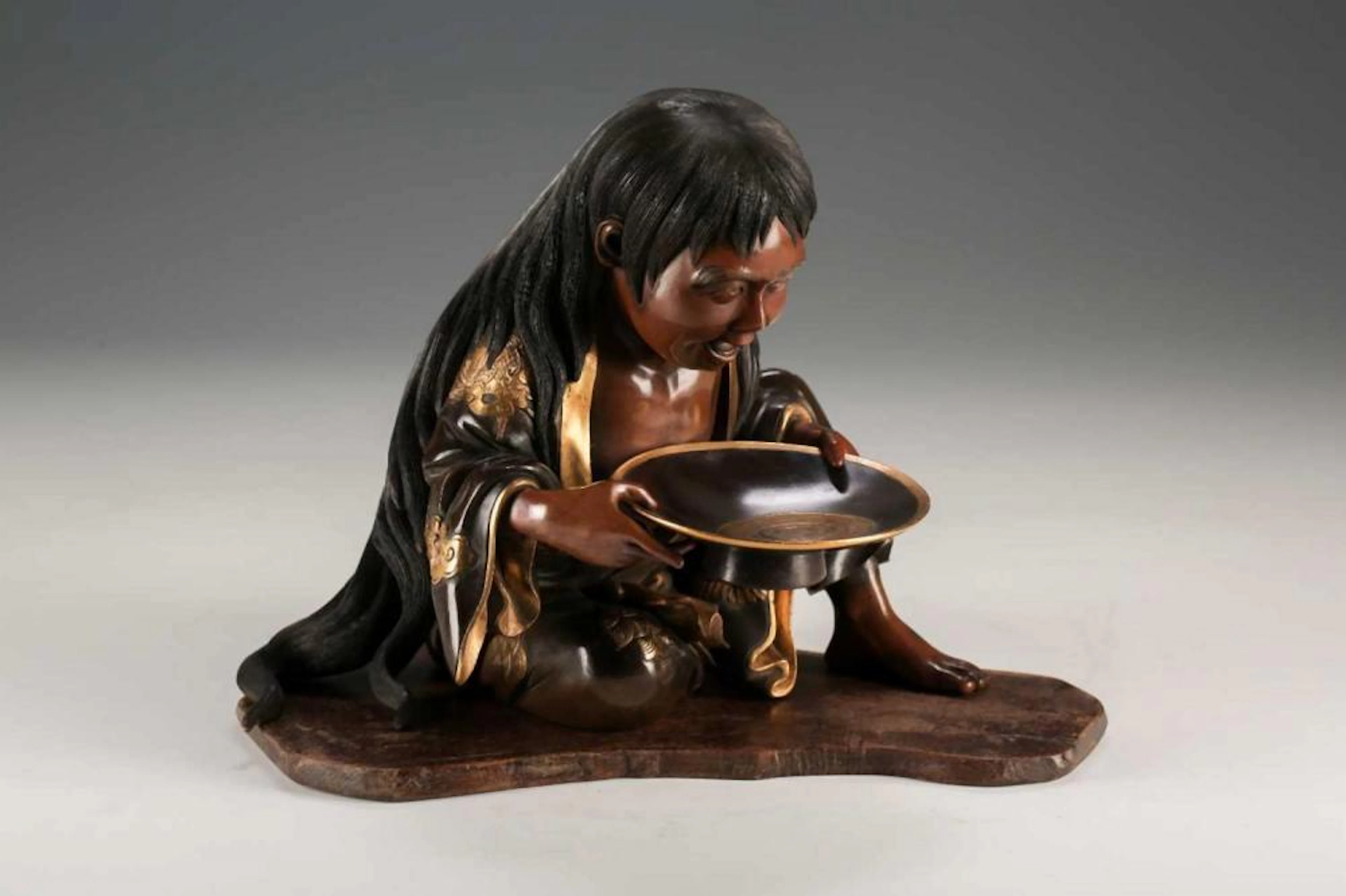 A Japanese bronze and gilt metal figure of Shojo, Meij period, th