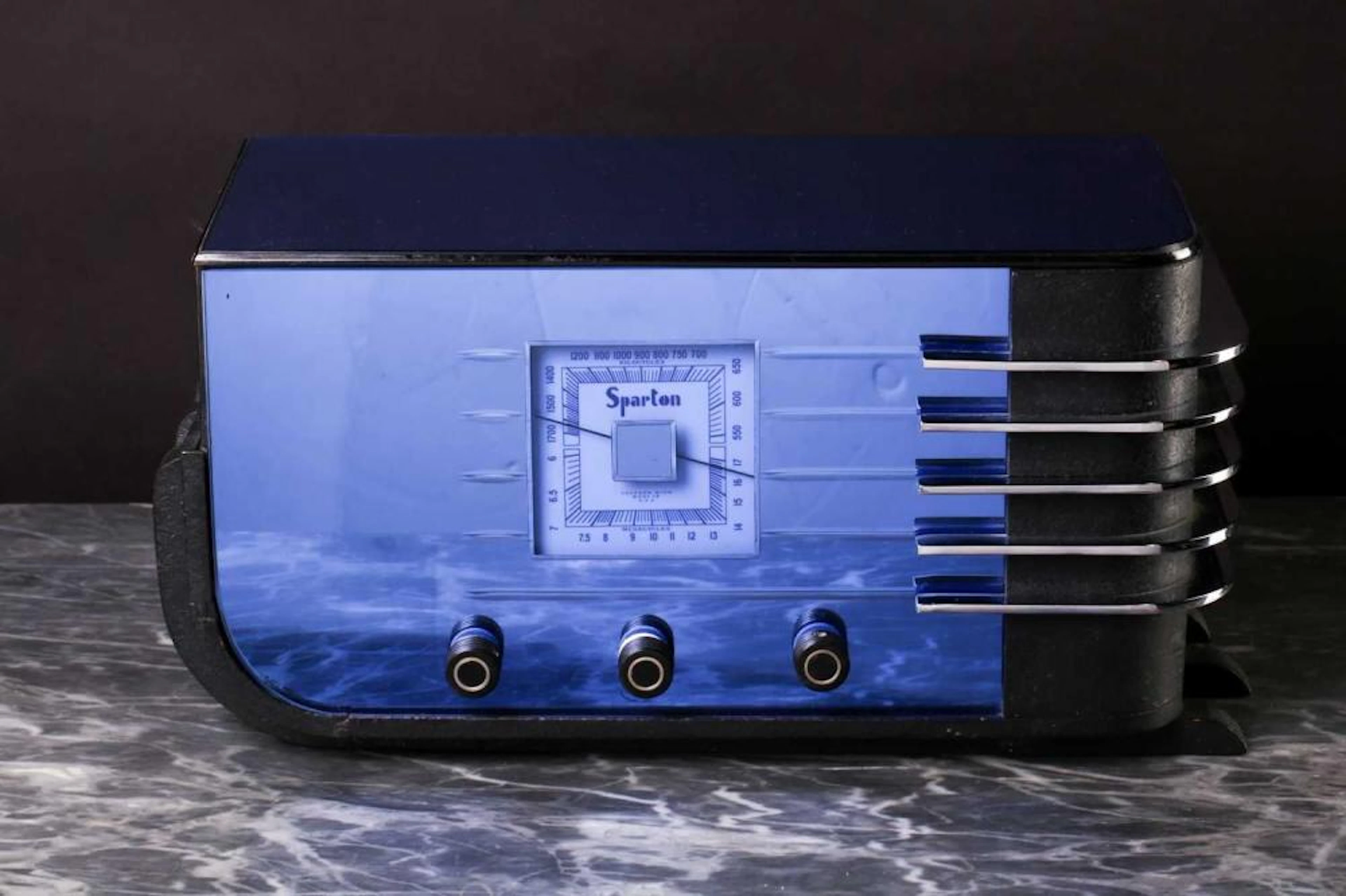 A rare Sparks Withington 'Sparton 557' blue mirror 'Sled' valve radio