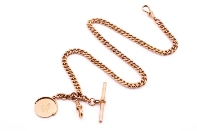 A 9 carat rose gold curb pattern watch chain