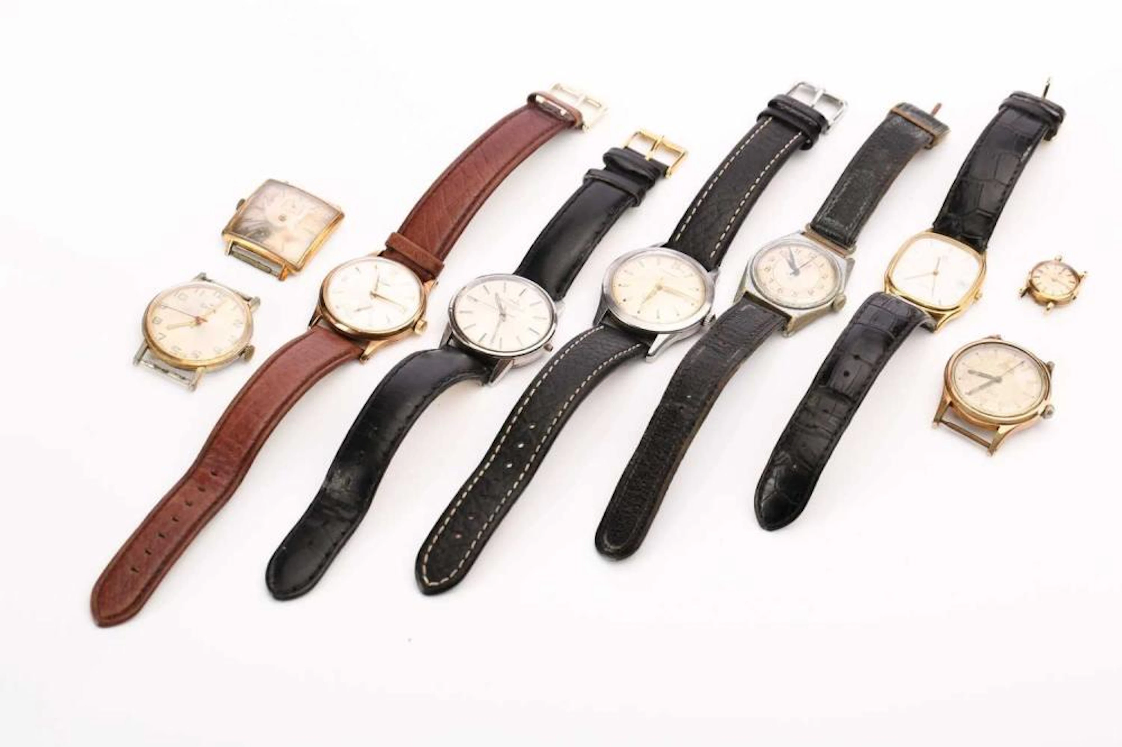 Eight gentlemen's vintage wristwatches, comprising?