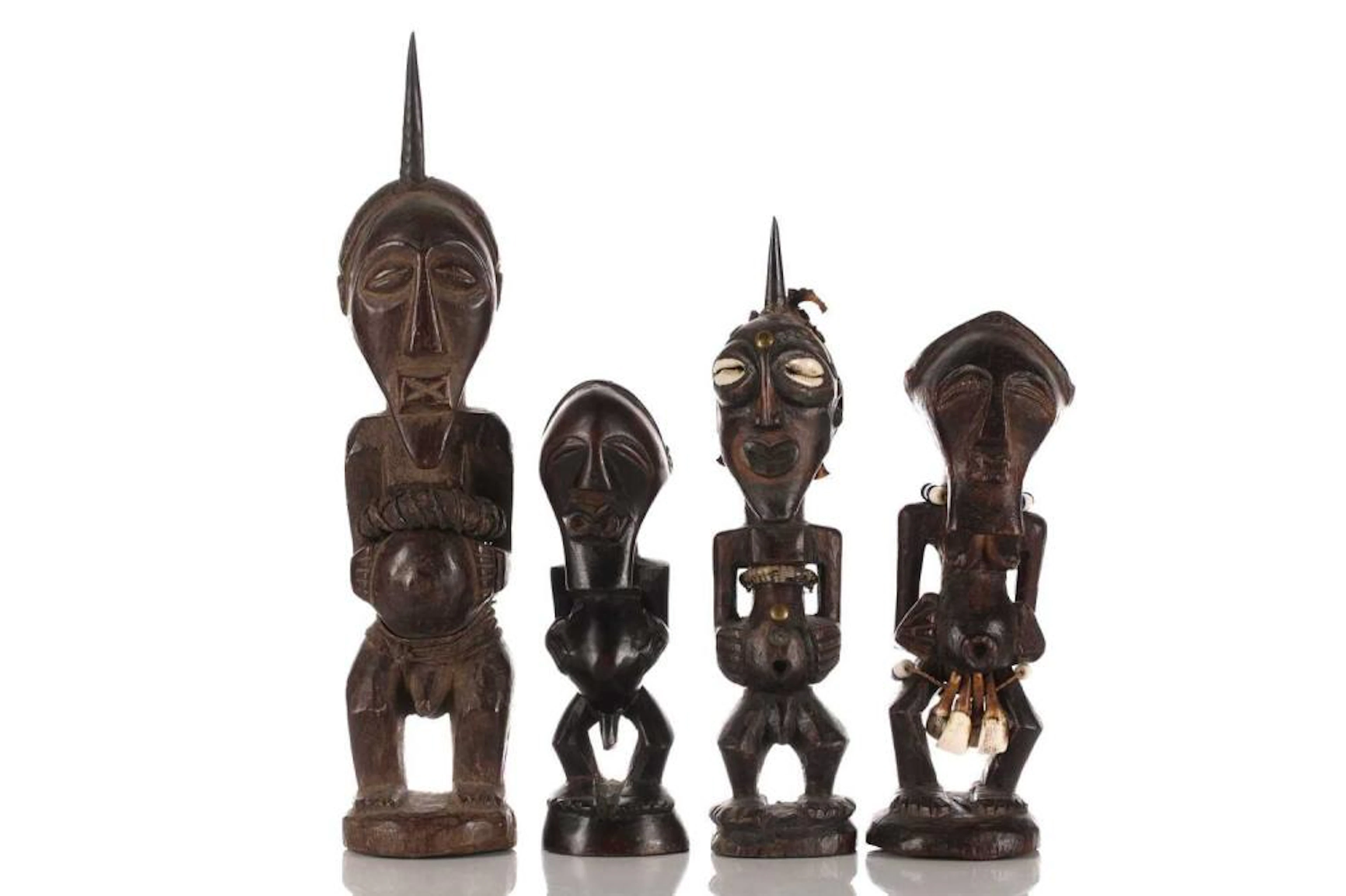 Four Songye Nkisi/Nkishi power figures