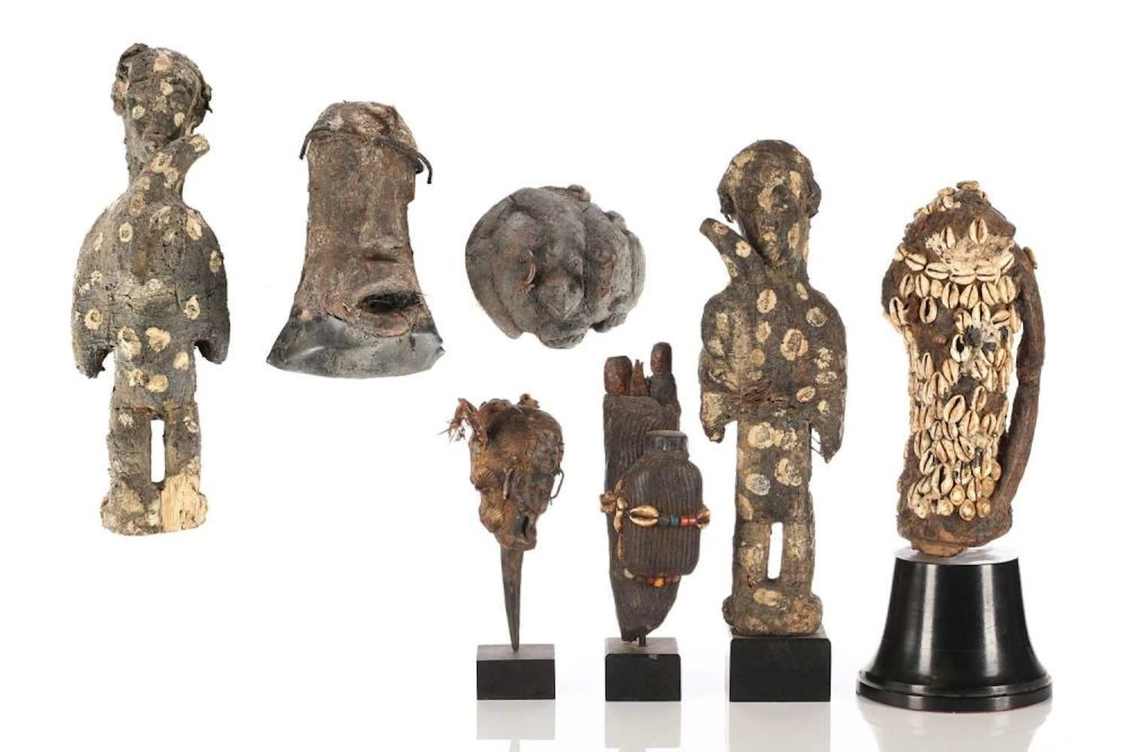 A group of seven West African fetish figures