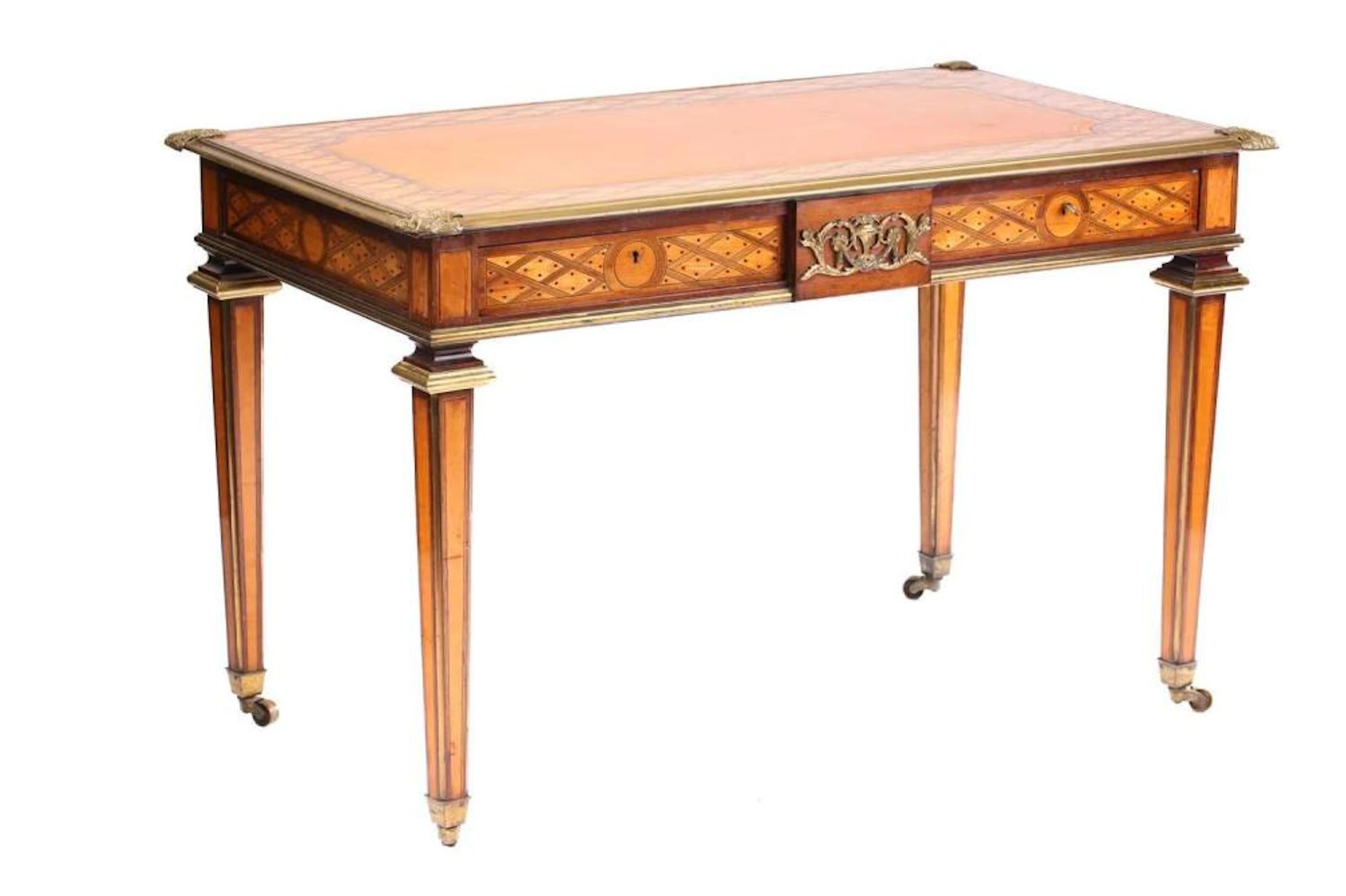 In the manner of Jean-Henri Riesener a Louis XVI style...