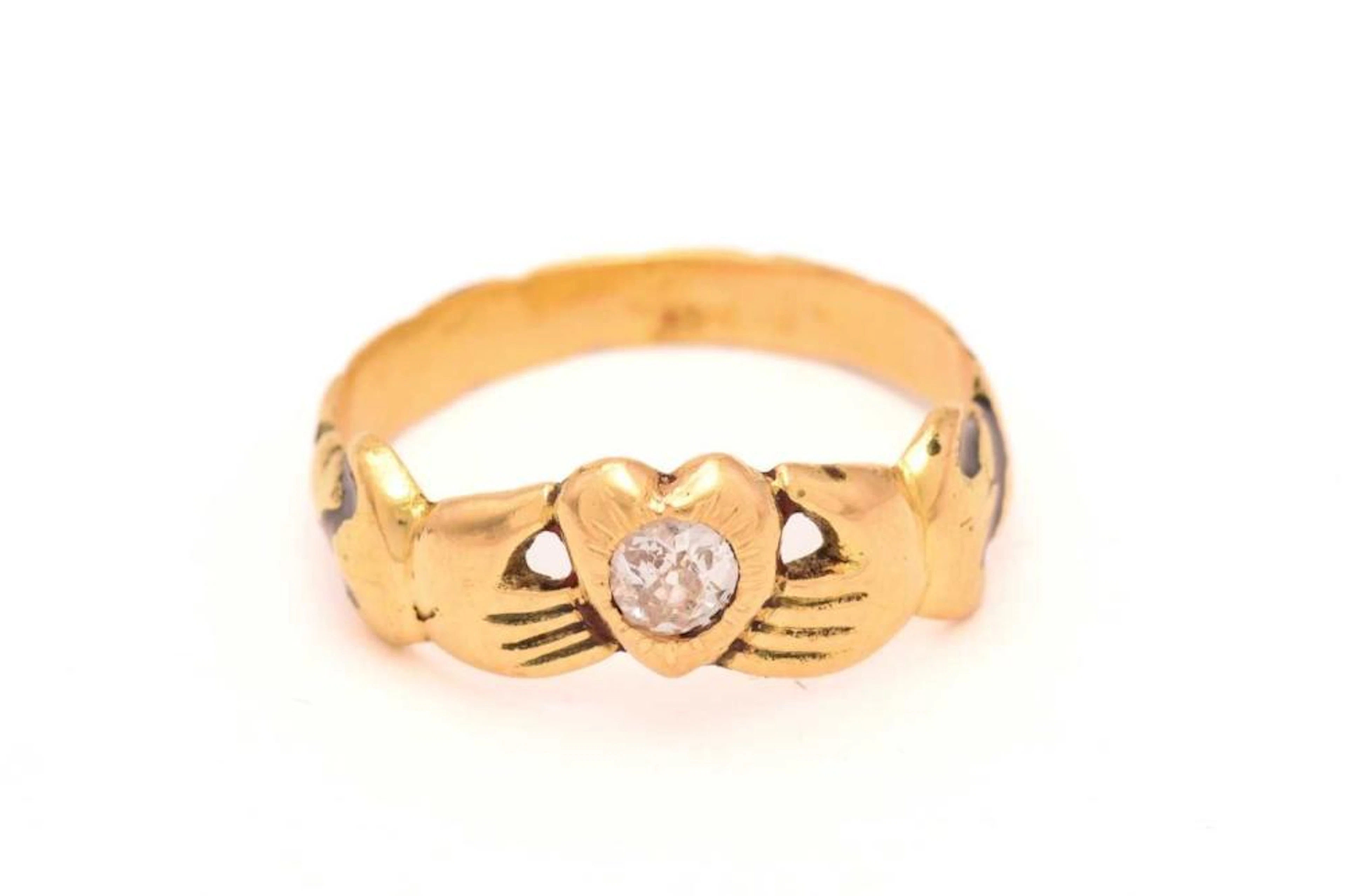 A Fede ring set with a diamond