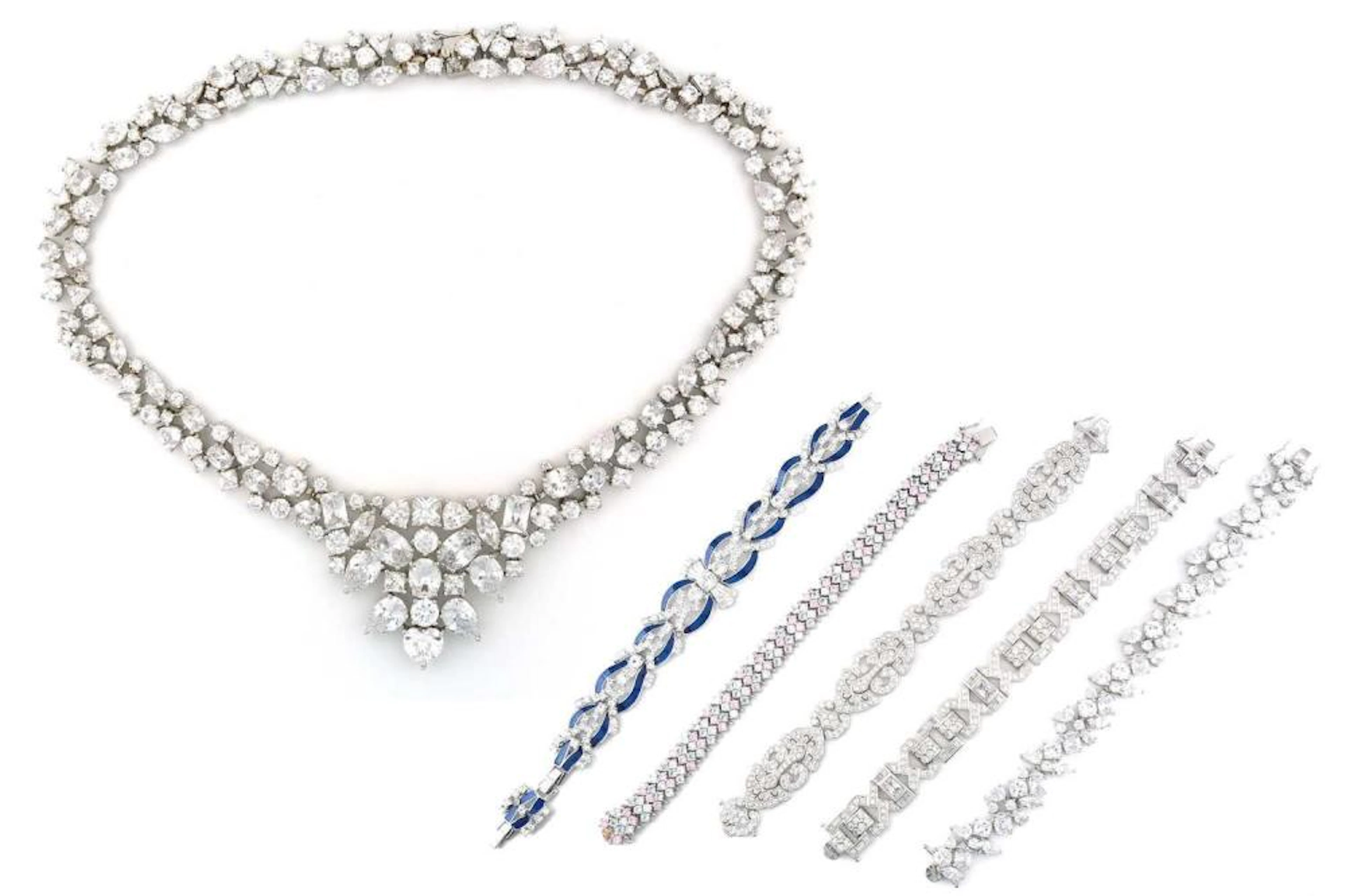 A silver and cubic zirconia necklace and bracelet set