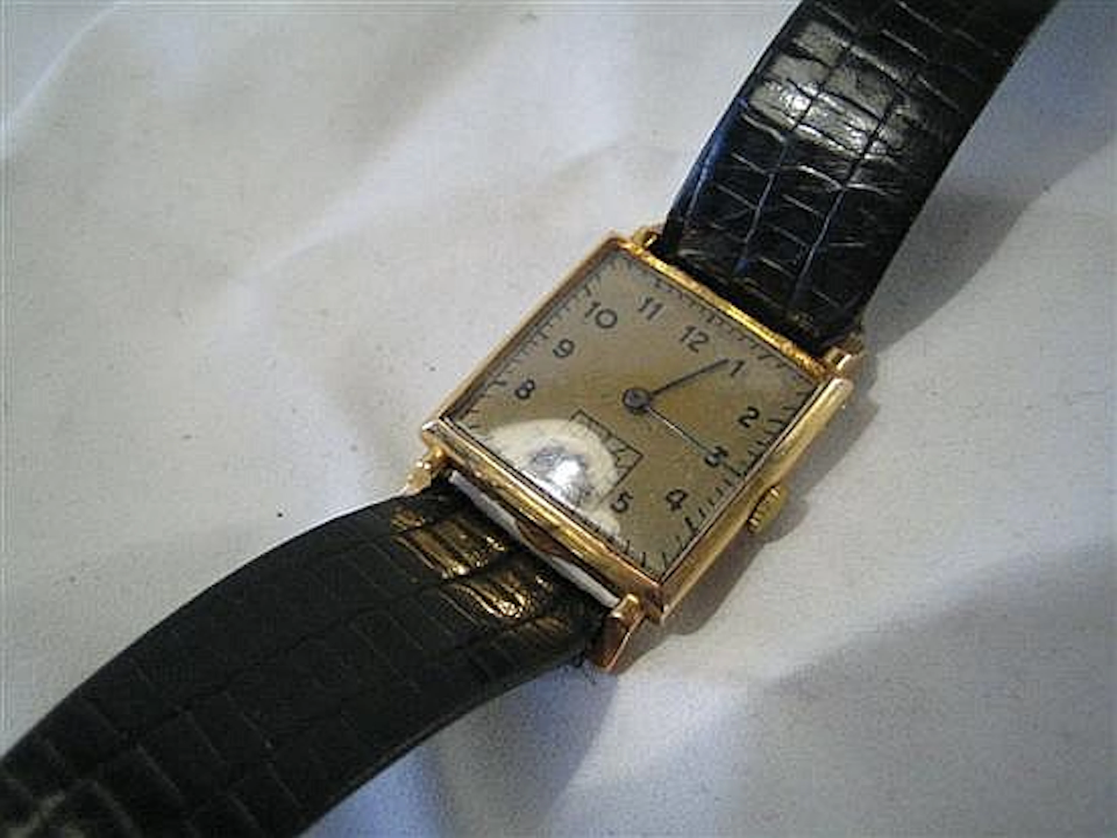 A GENTLEMAN'S BUCHERER ART DECO 18ct GOLD WRIST-WATCH...