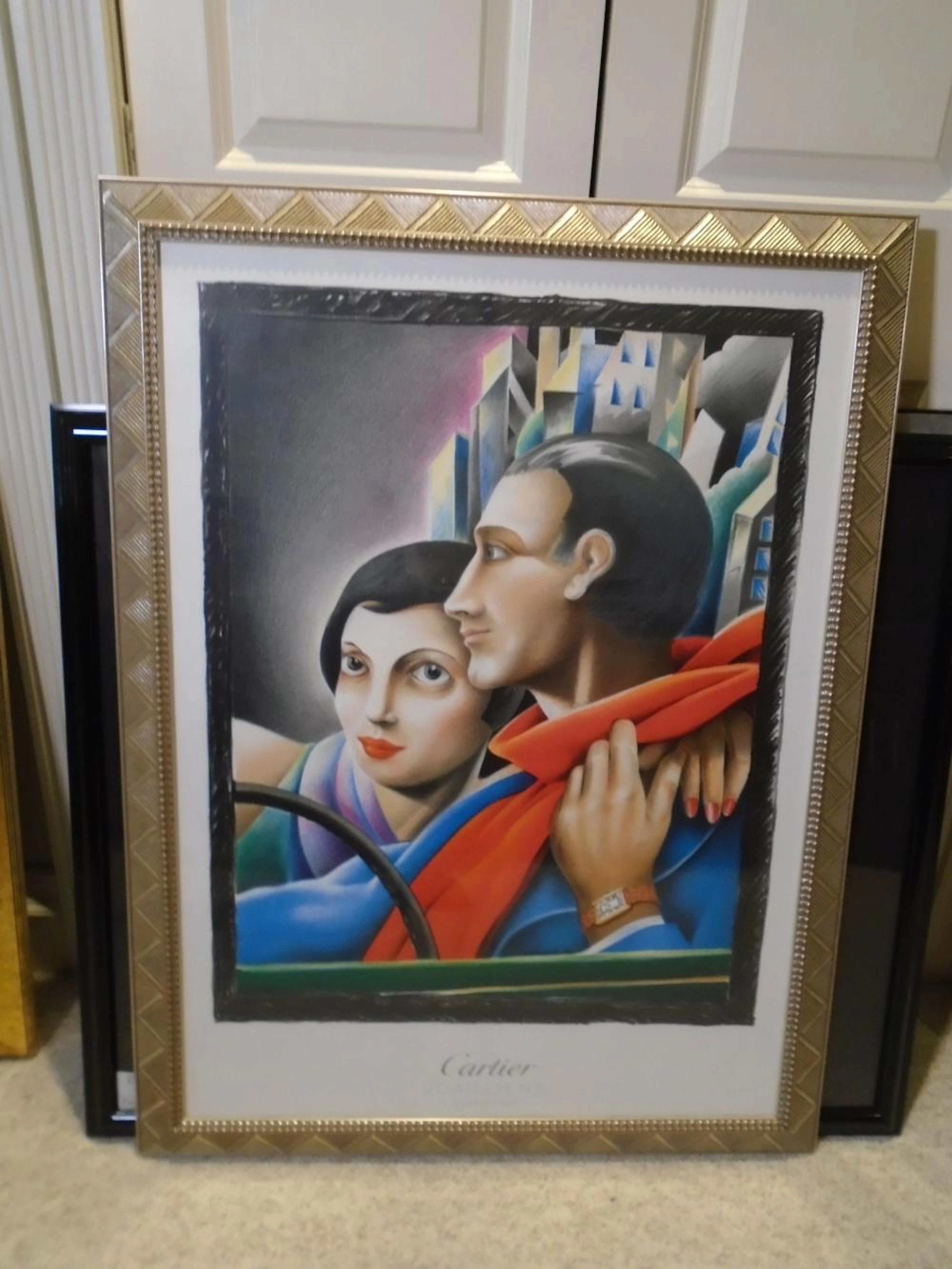 Framed Cartier Poster.