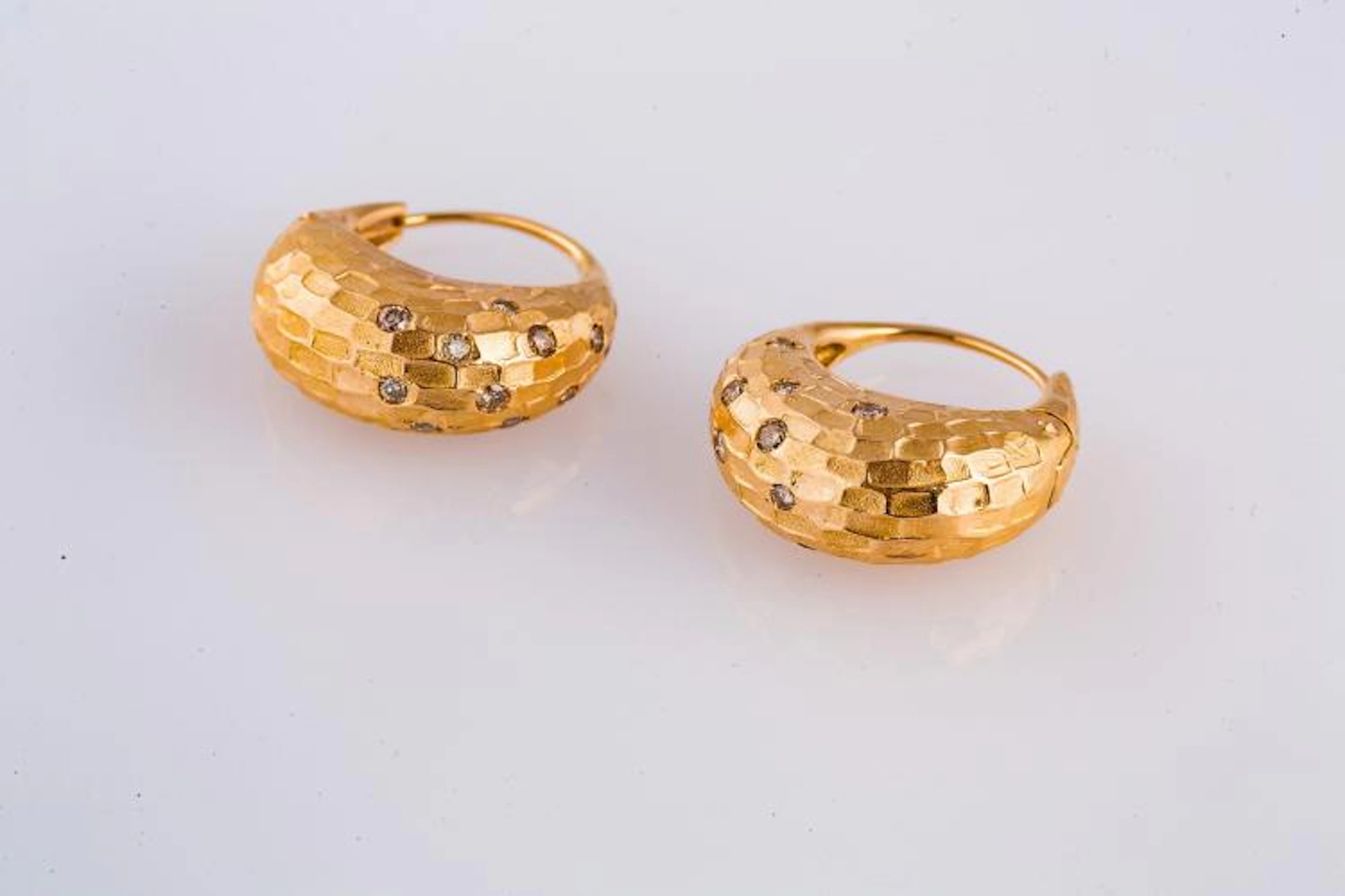 POMELLATO Orecchini in oro gr 17.10 e diamanti brown.