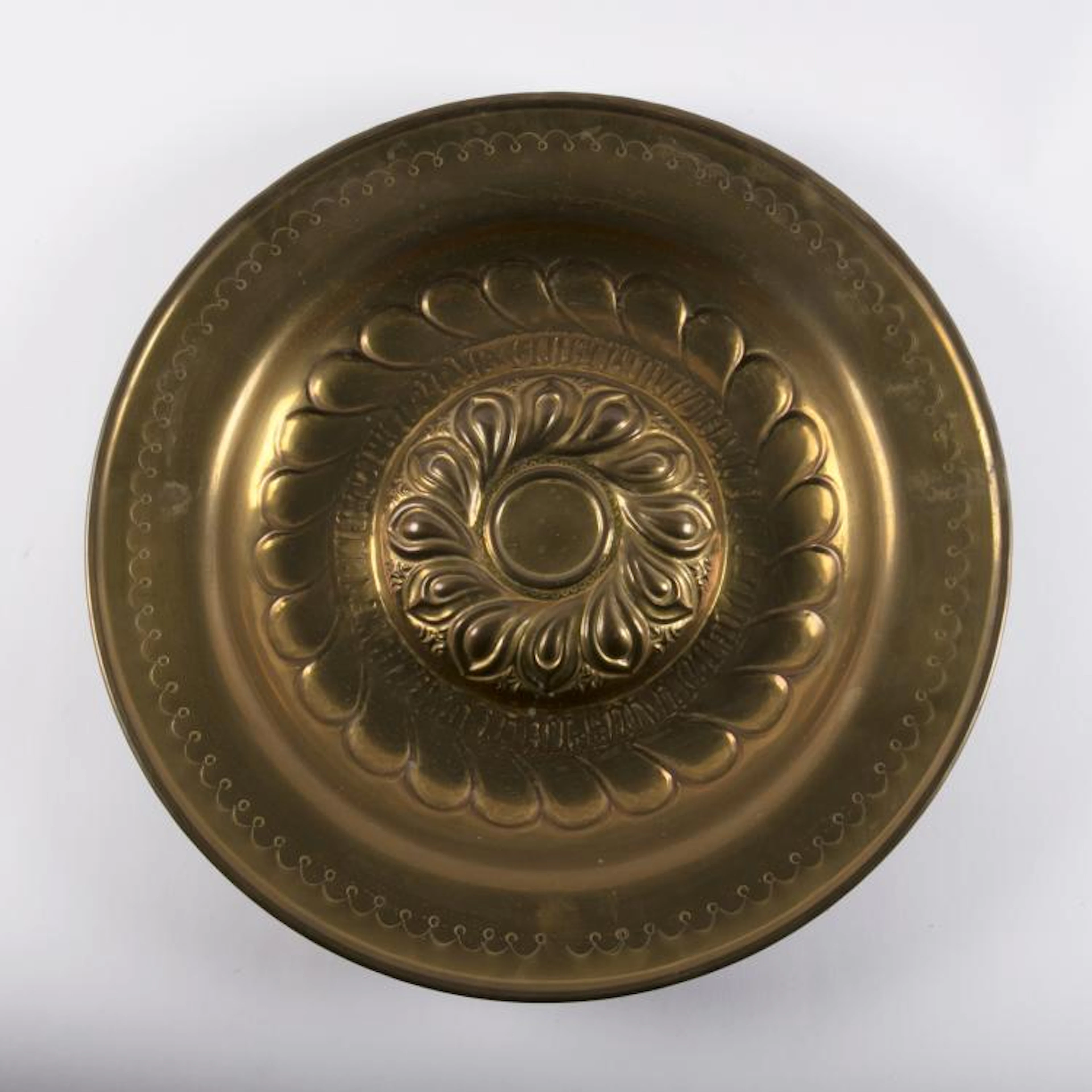 ITALY 17th CENTURY Embossed copper almoner plate