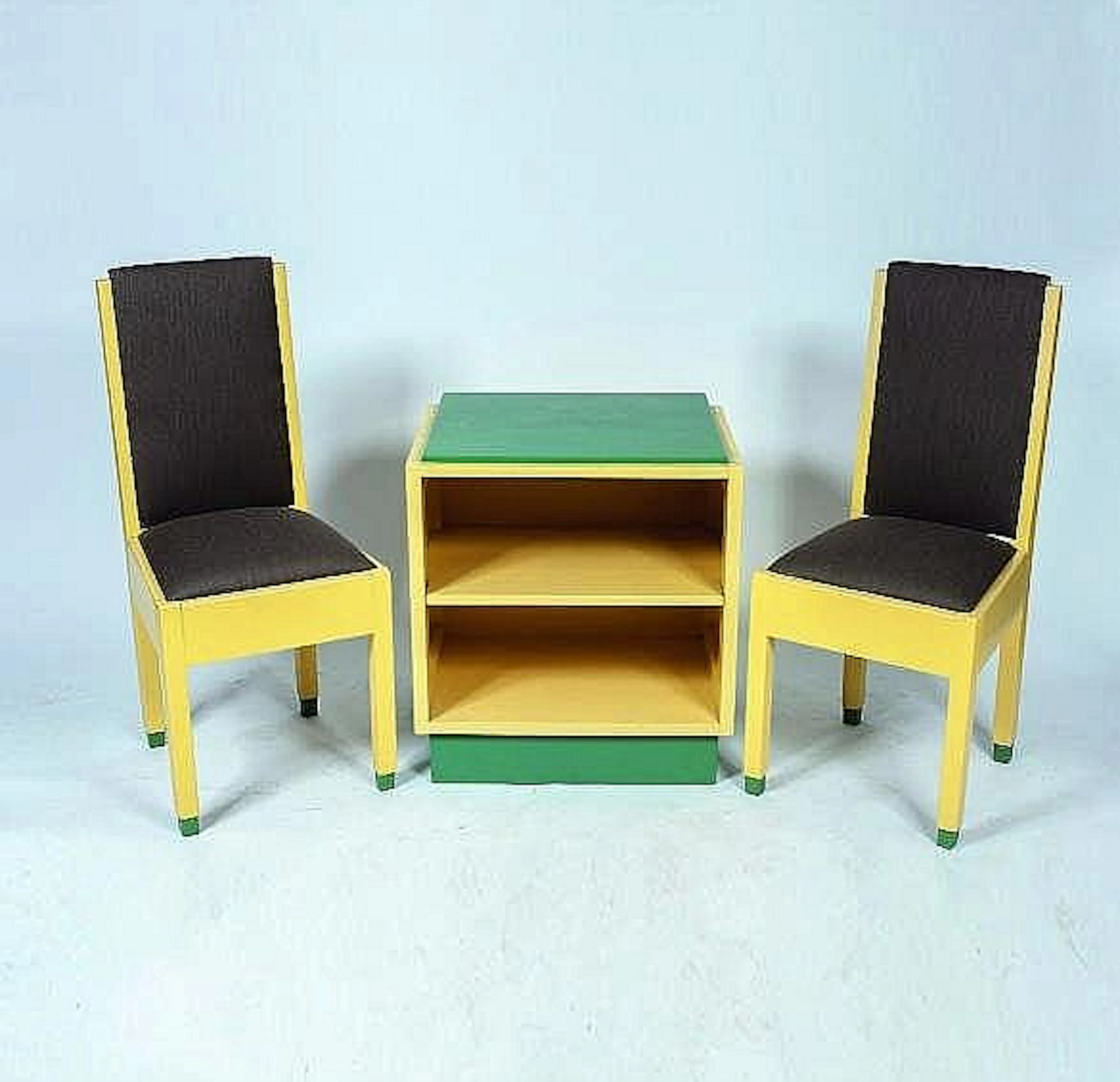 Two sidechairs and a cabinet