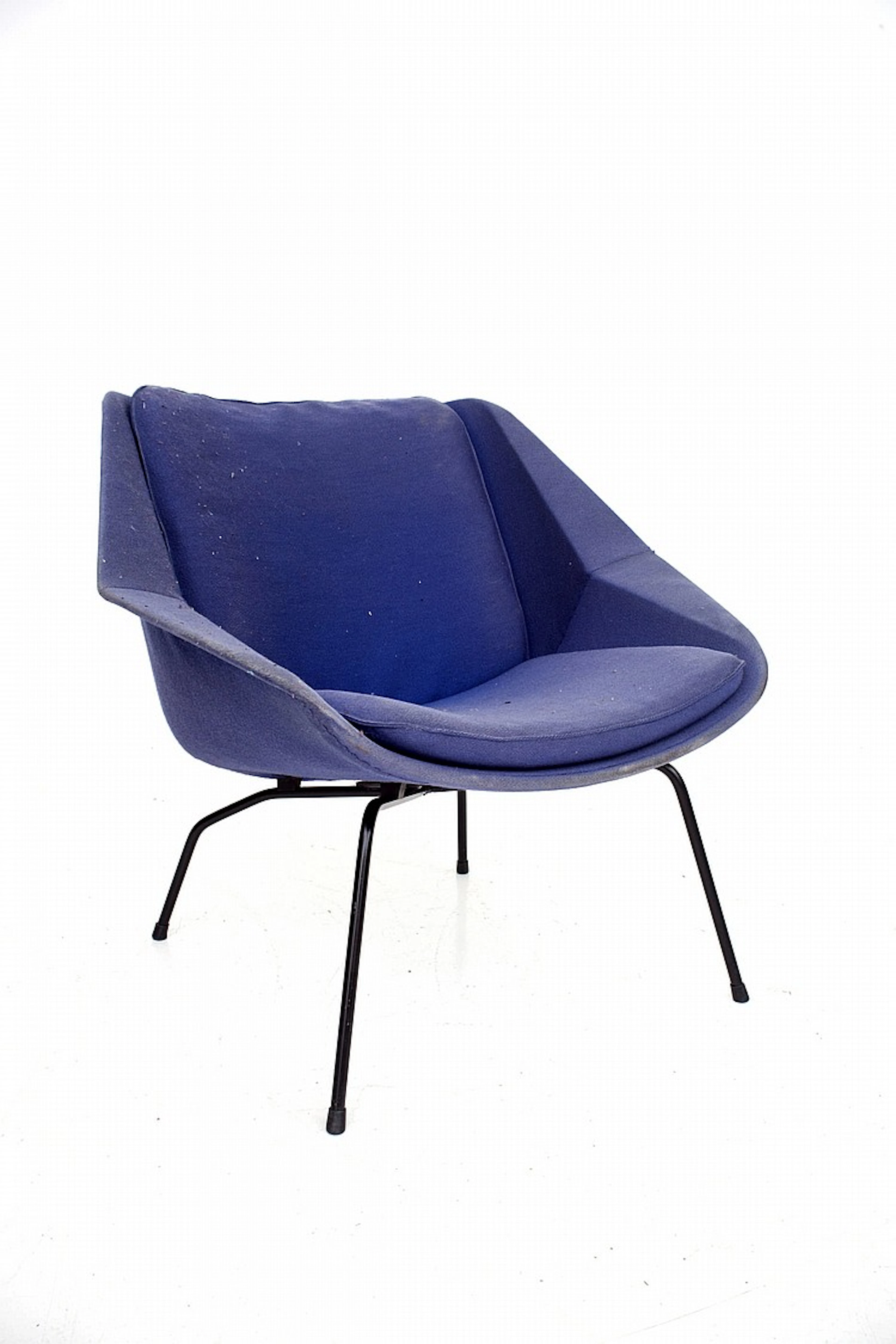 Cees Braakman (1917-1995) A blue upholstered easy chair on black metal frame