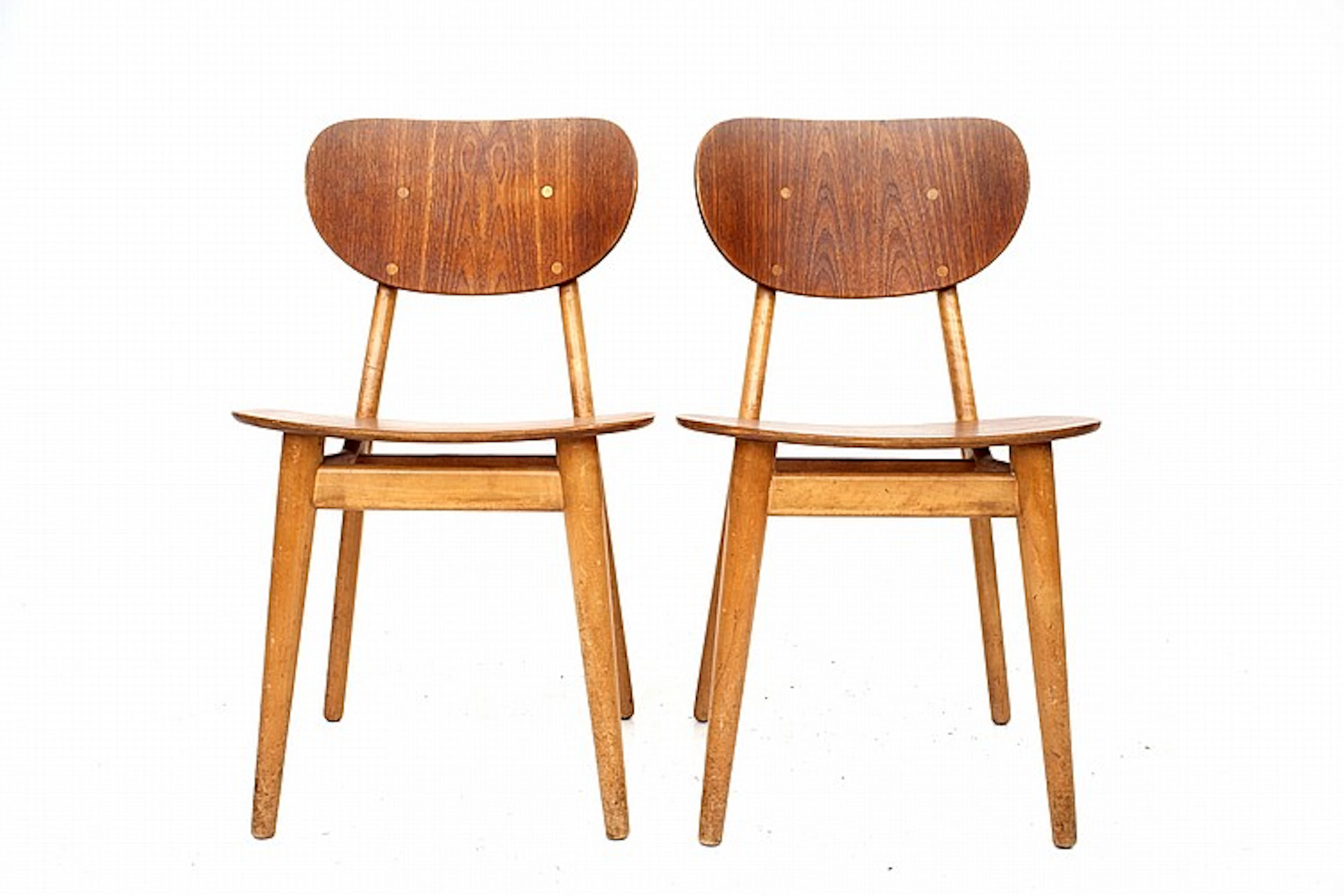 Cees Braakman (1917-1995) A pair of birch and teak veneered SB11 dining chairs