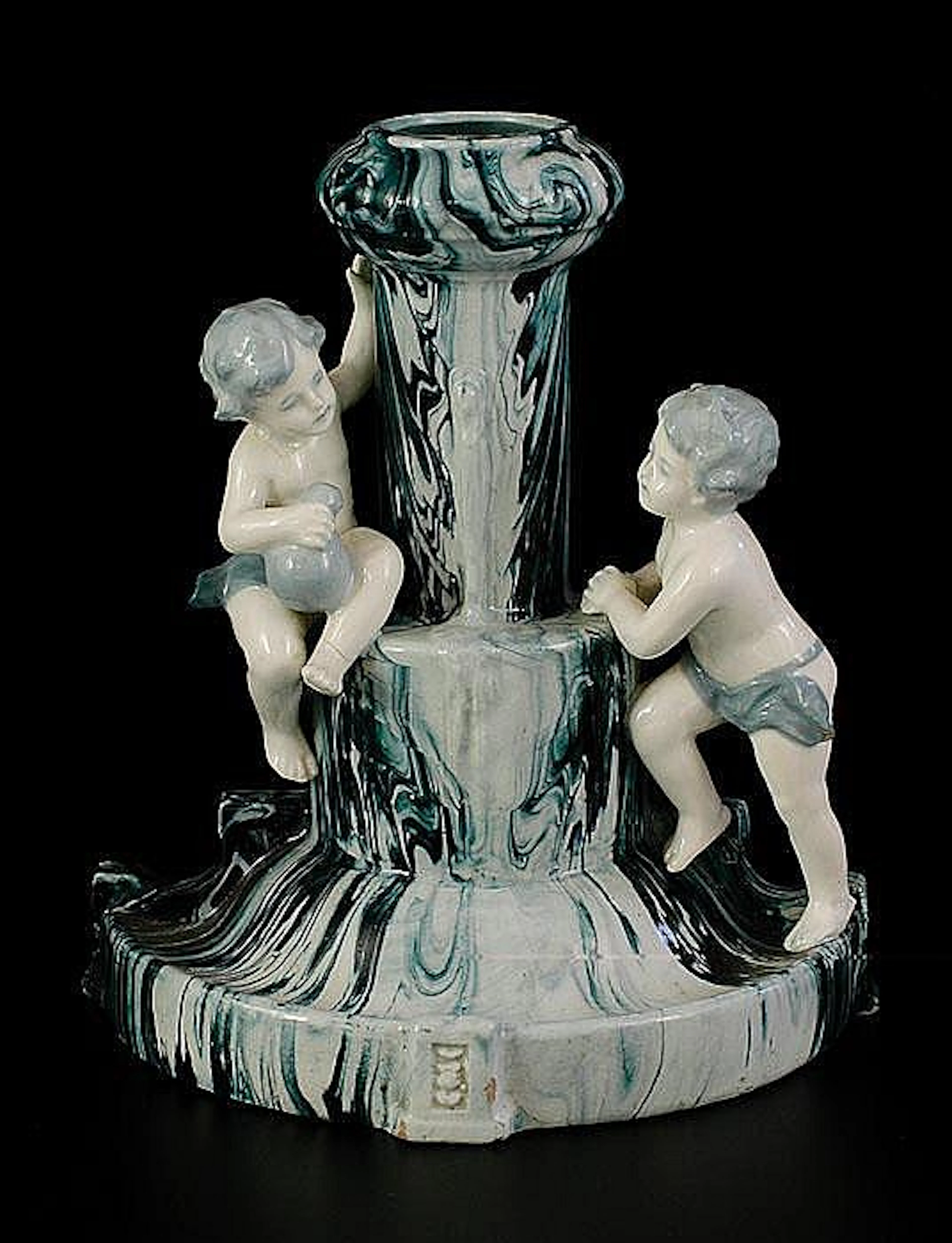 Figural candlestick