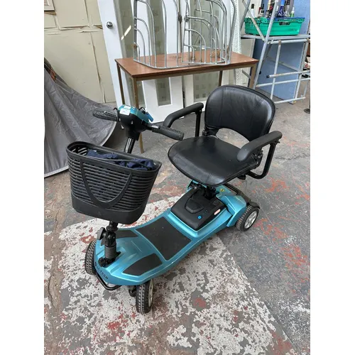 A Li-Tech Air+ mobility scooter with key, charger and cover | Barnebys