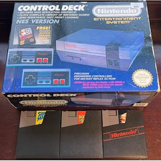 Vintage boxed Nintendo Nes console with three games; Super M...