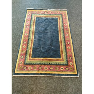 A Hand Knotted Gabbeh Turkish Rug set with a blue centre & T...