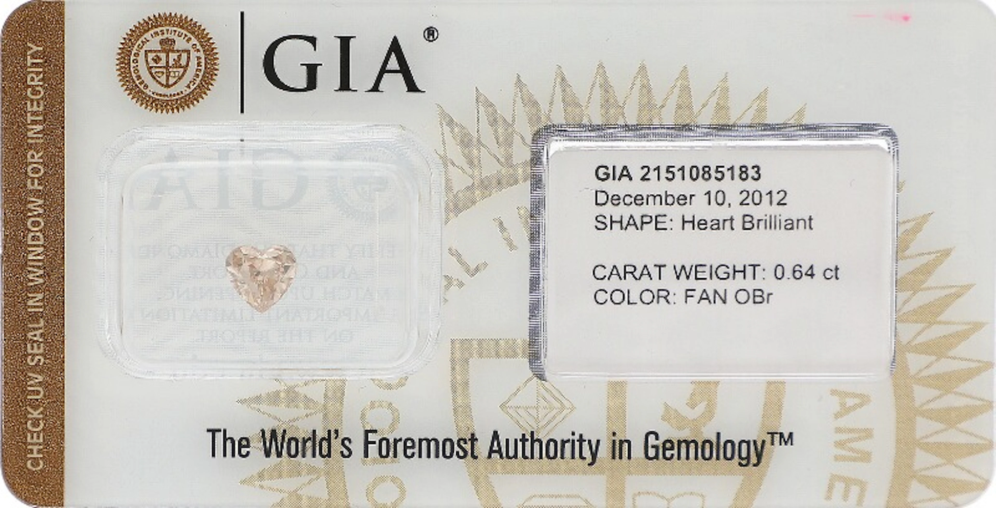 An unmounted heart-shaped diamond weighing 0.64 ct