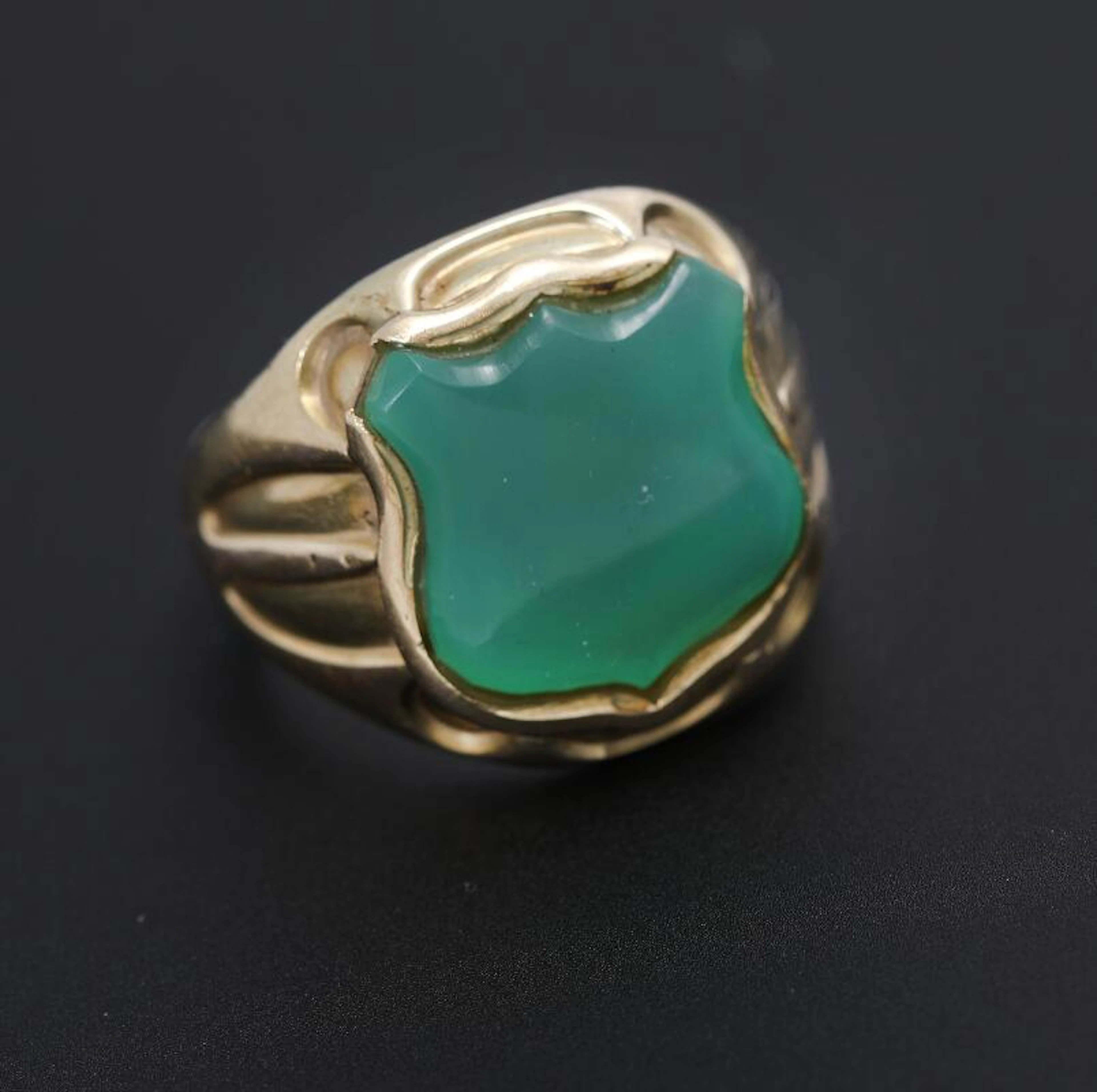 A chrysopras ring set with carved chrysopras