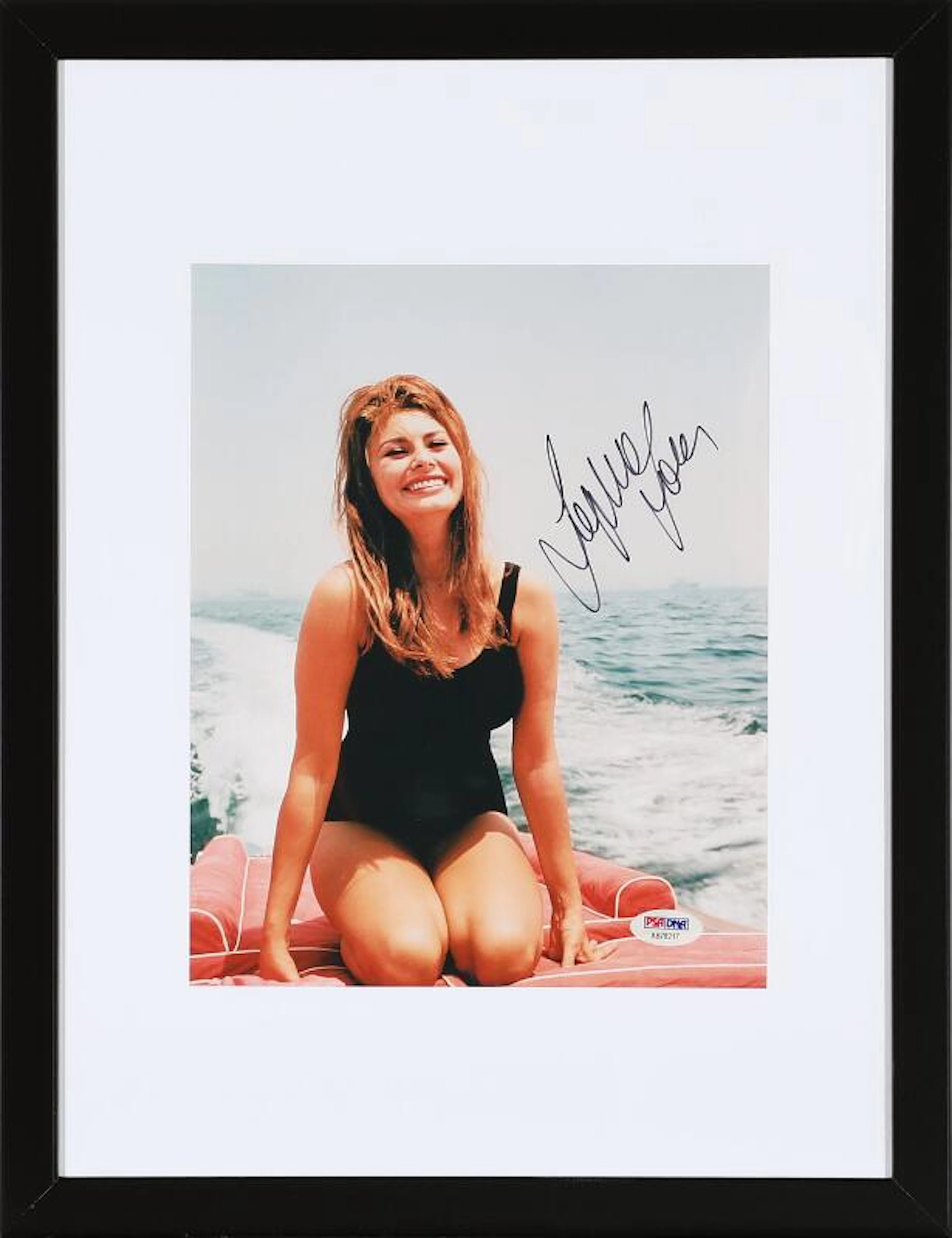 A signed colour photograph of the Italian actress Sophia Loren