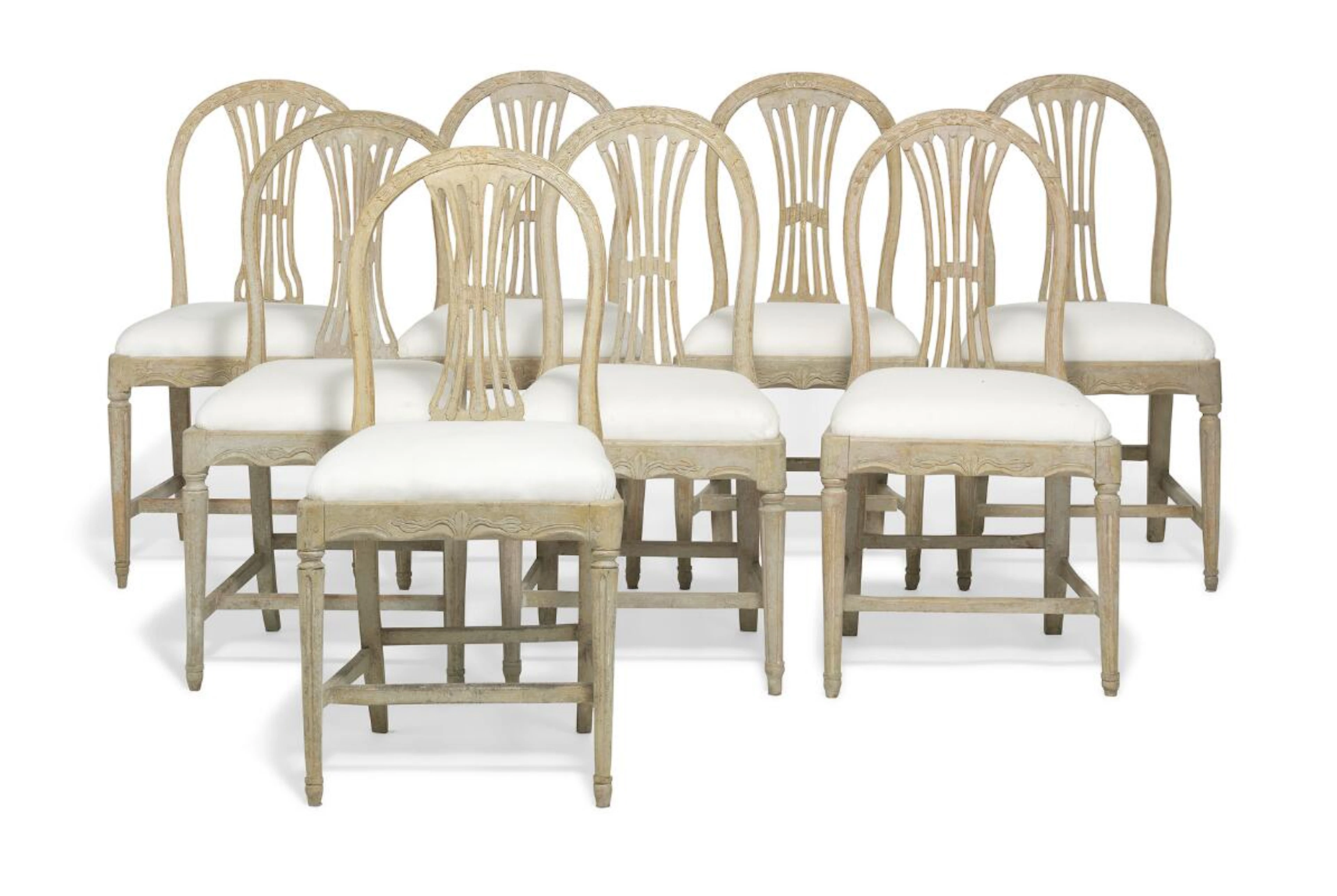 A set of eight similar Gustavian chairs each with arched back