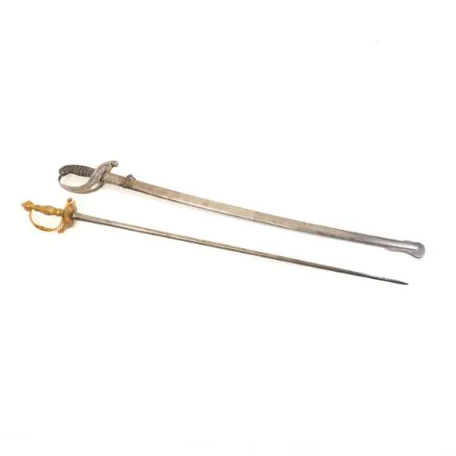 A fine rococo small-sword with a gilded brass hilt decorated | Barnebys