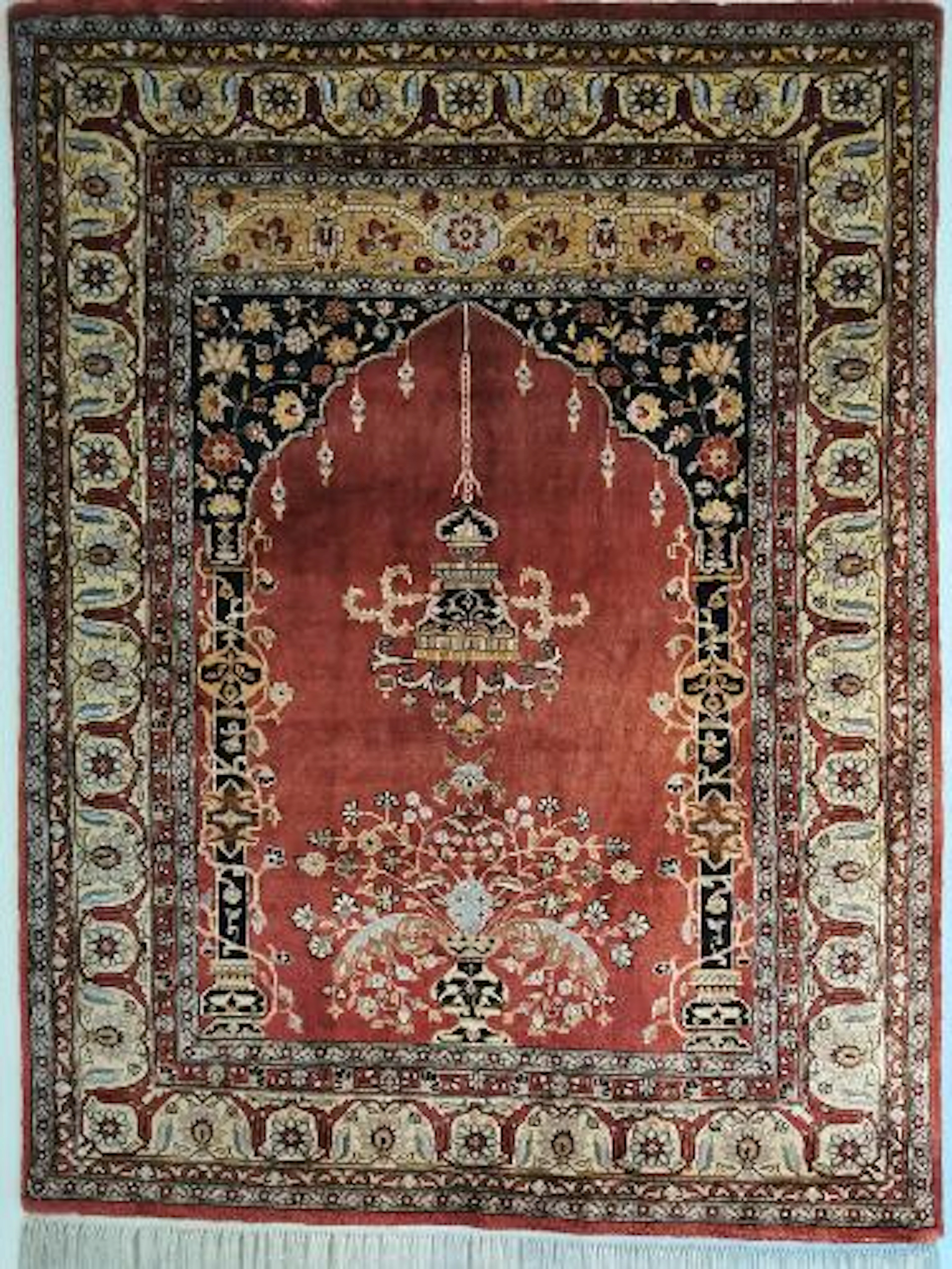 A Turkish silk prayer rug