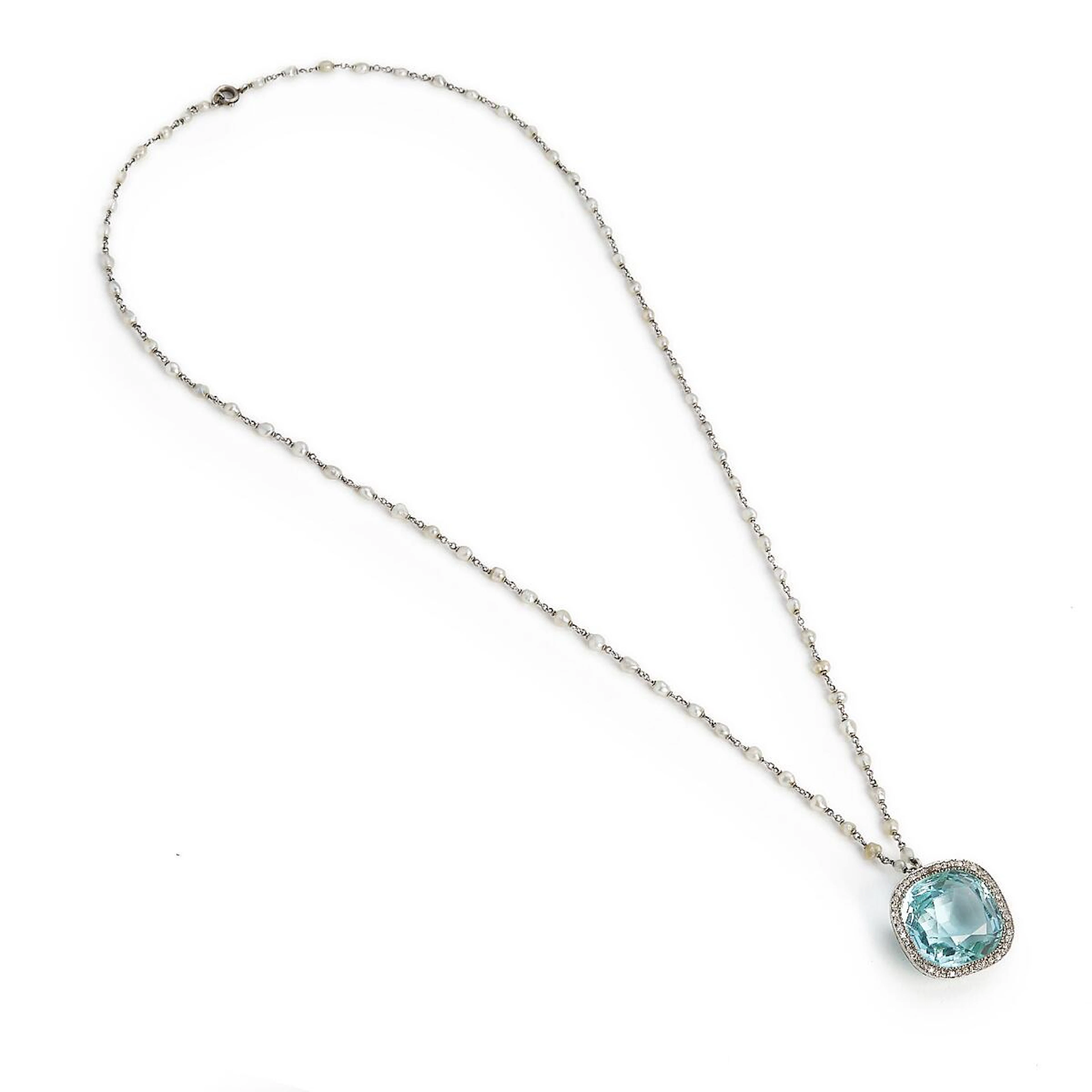 An aquamarine and diamond necklace set with a cushion-cut...