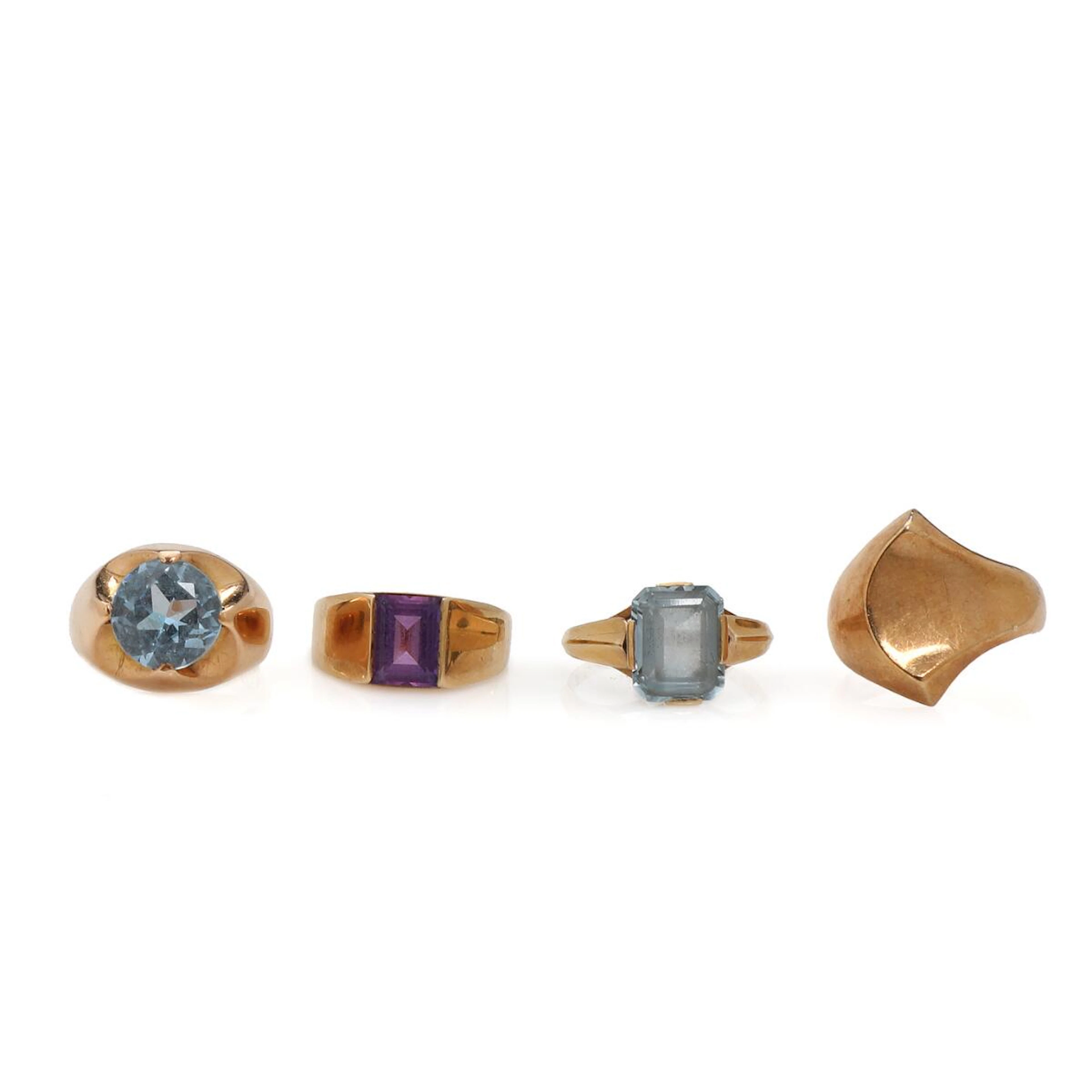 Four rings repectivly set with spinel and syntetic purple sapphire